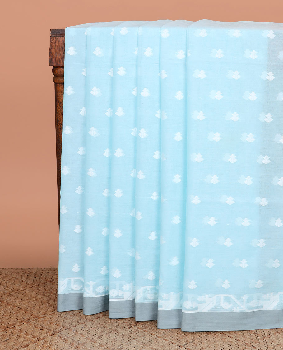 Blue buttas woven Khadi cotton saree, contrast jamdani floral border, and jamdani-style floral creeper woven pallu