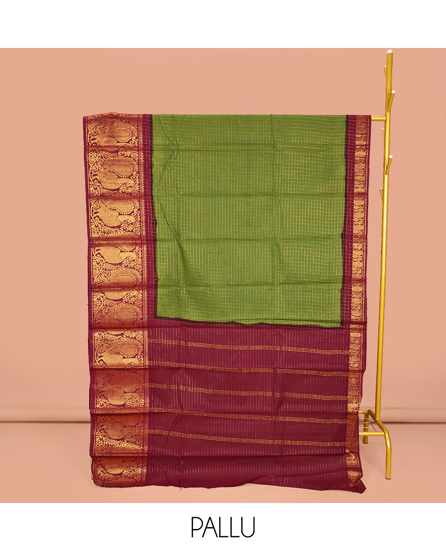 Green Sungudi Cotton Saree, Detailed with Zari Checks on Its Body, Complemented by a Contrast Traditional Zari Border of Big Peacocks, Zari-Striped Pallu, and Paired with a Contrast Blouse