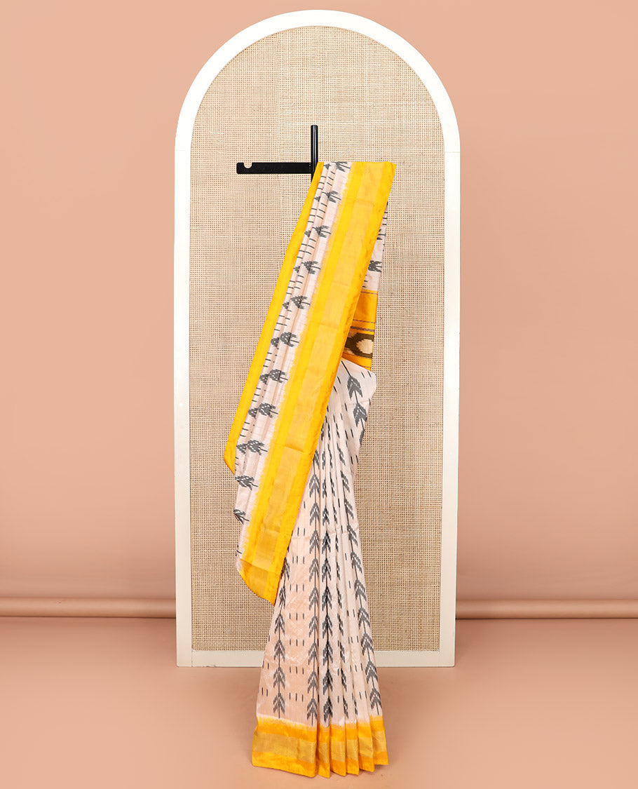 Sandal Ikkat Silk Saree with Ikkat Buttas, Brightened with a Contrast Yellow Border, Pallu Features Ikkat Geometric Patterns, and with a Contrast Blouse