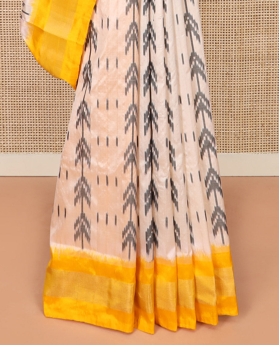 Sandal Ikkat Silk Saree with Ikkat Buttas, Brightened with a Contrast Yellow Border, Pallu Features Ikkat Geometric Patterns, and with a Contrast Blouse