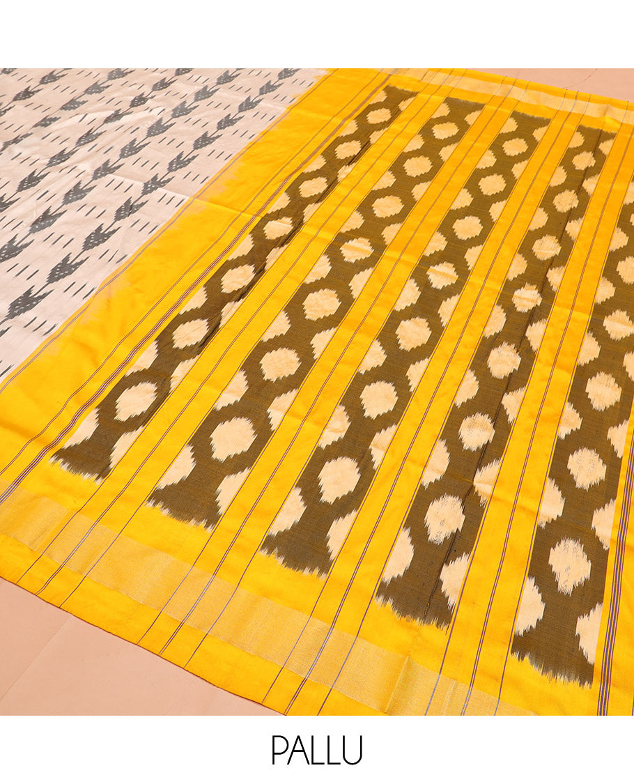 Sandal Ikkat Silk Saree with Ikkat Buttas, Brightened with a Contrast Yellow Border, Pallu Features Ikkat Geometric Patterns, and with a Contrast Blouse