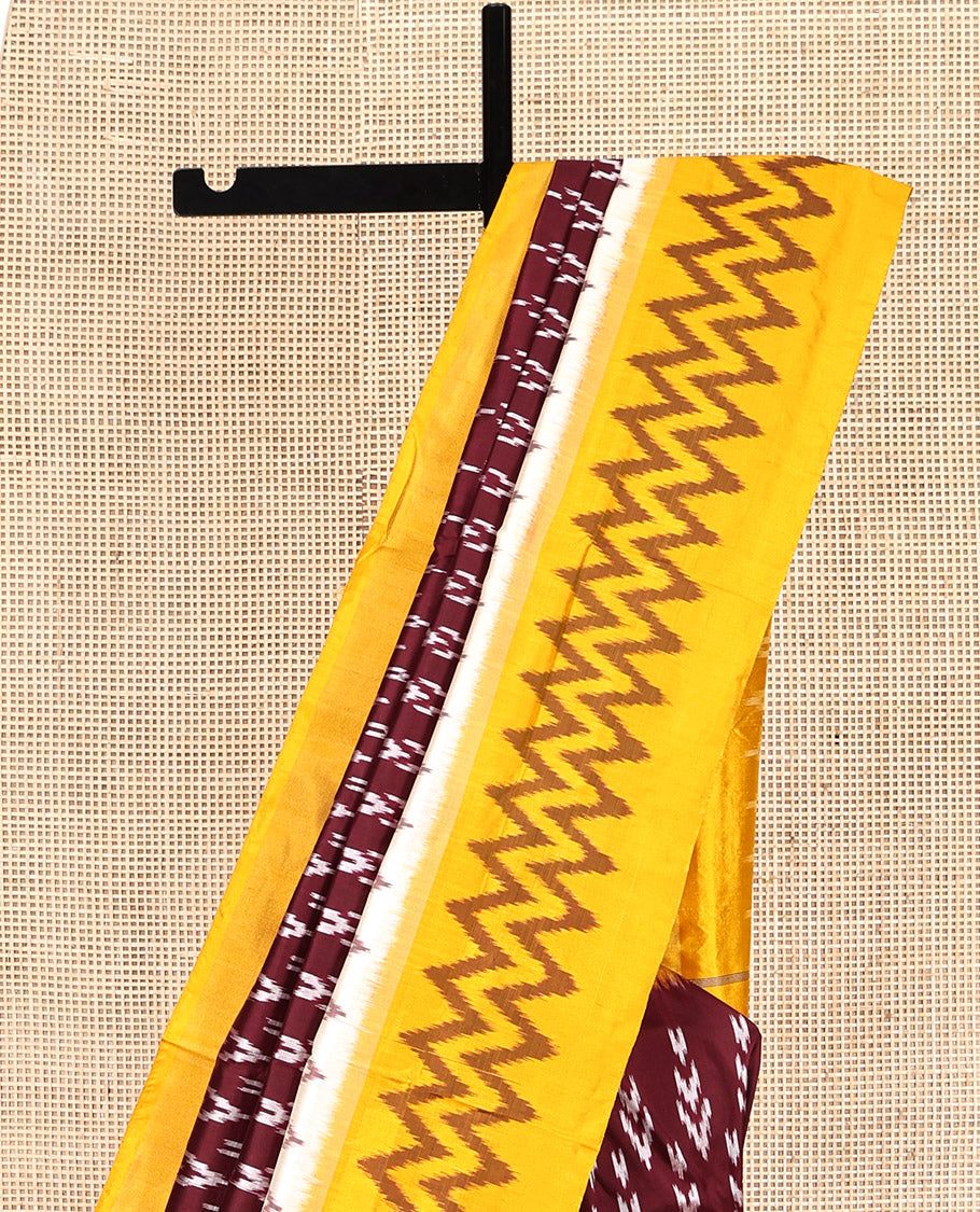 Maroon Pochampally Ikat Silk Saree, Delicately Woven with Buttas, Complemented by a Contrast Border, Ikat-Style Jaal Pallu, and Contrast Blouse