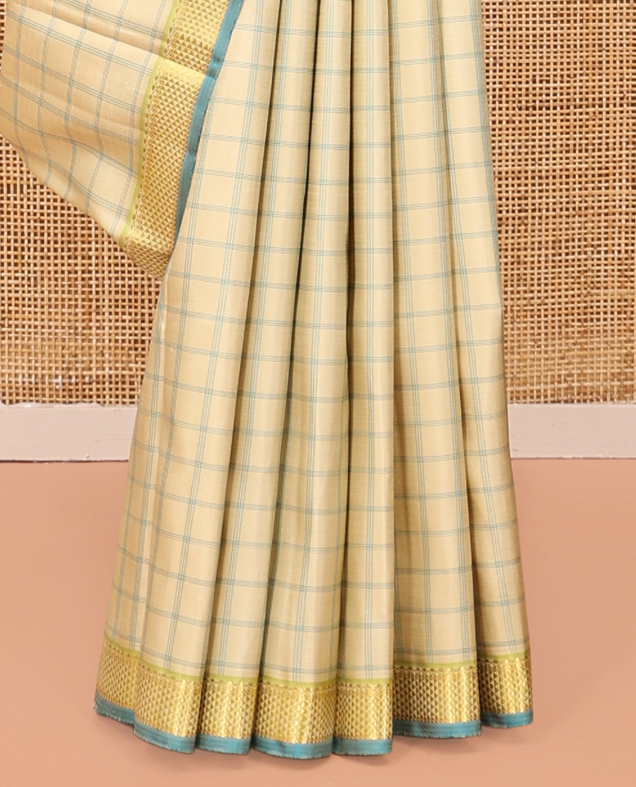 Sandal Kanchipuram Silk Saree, Styled with Checks, Complemented by Contrast Ara Maadam Border, Zari Striped Pallu, and Contrast Blouse