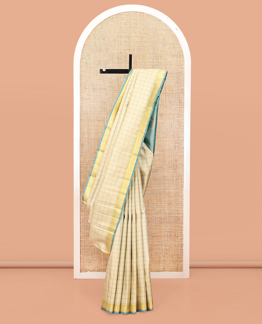 Sandal Kanchipuram Silk Saree, Styled with Checks, Complemented by Contrast Ara Maadam Border, Zari Striped Pallu, and Contrast Blouse