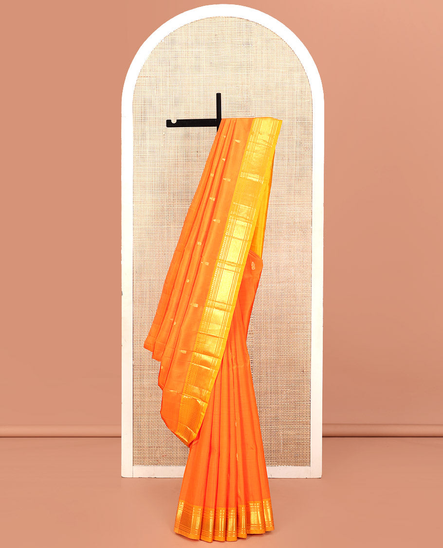 Orange Kanchipuram Silk Saree, Embellished with Zari Buttas, Contrast One-Sided Border of Paneer Sombu, Banaras, Muthu, and Mayil Kann Design, Zari Design Pallu, and No Blouse
