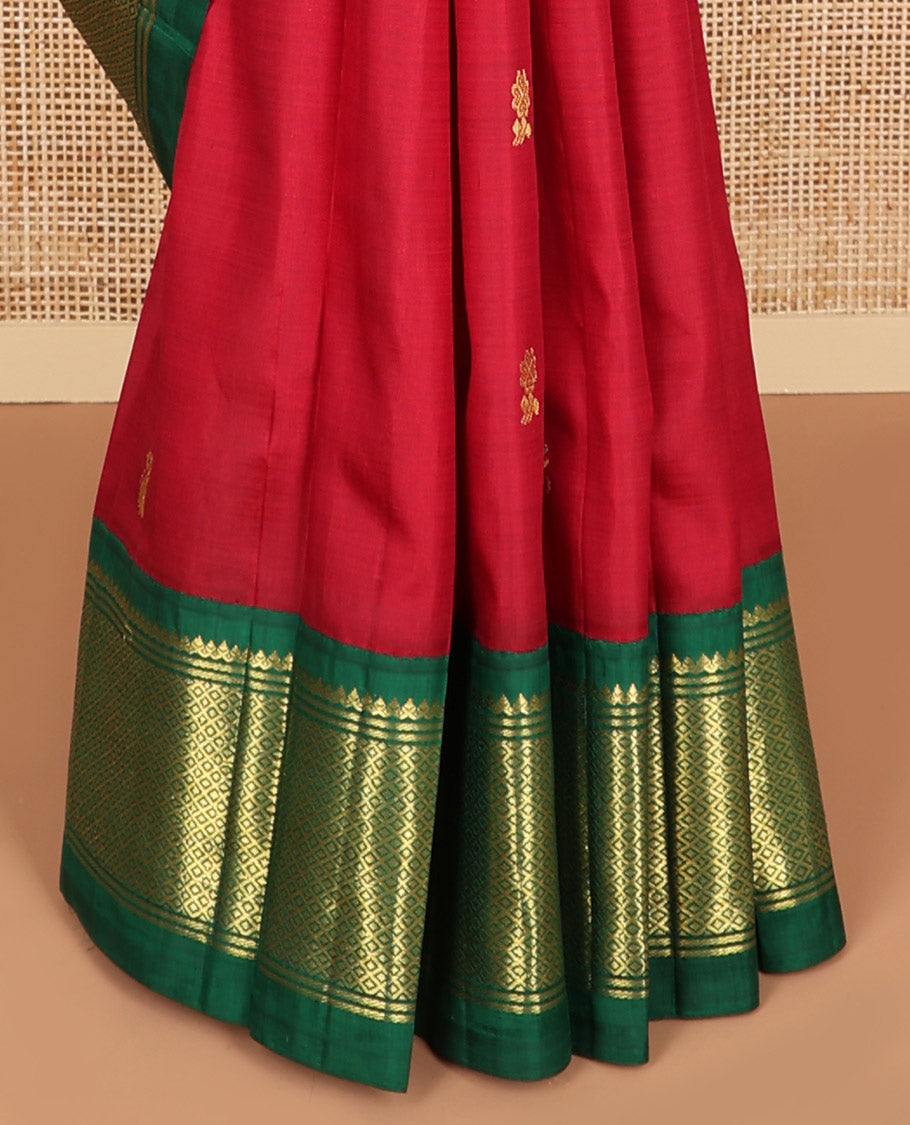 Red buttas kancheepuram silk saree with contrast korvai border of banaras, thilakam mokku, kuyil kann design & floral design pallu