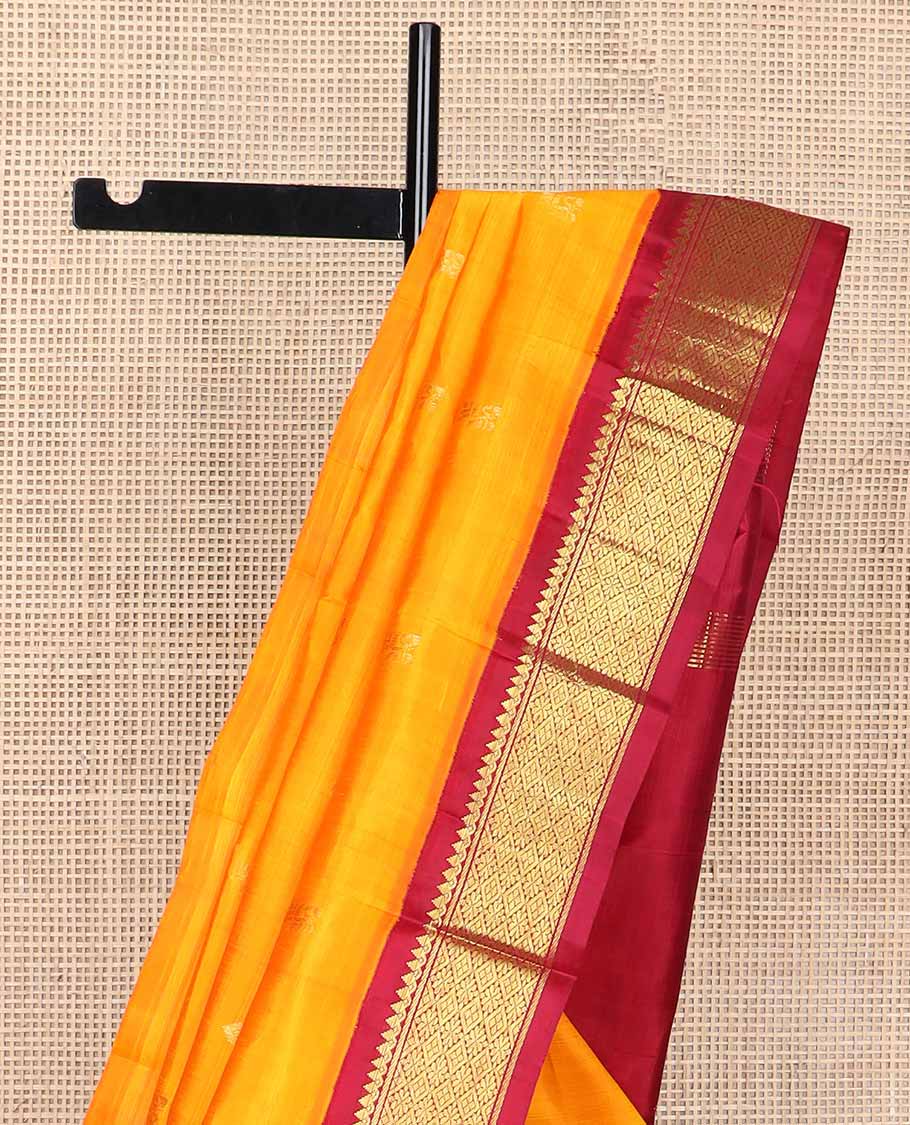 Orange buttas kancheepuram silk saree with contrast korvai zari design border & floral design pallu