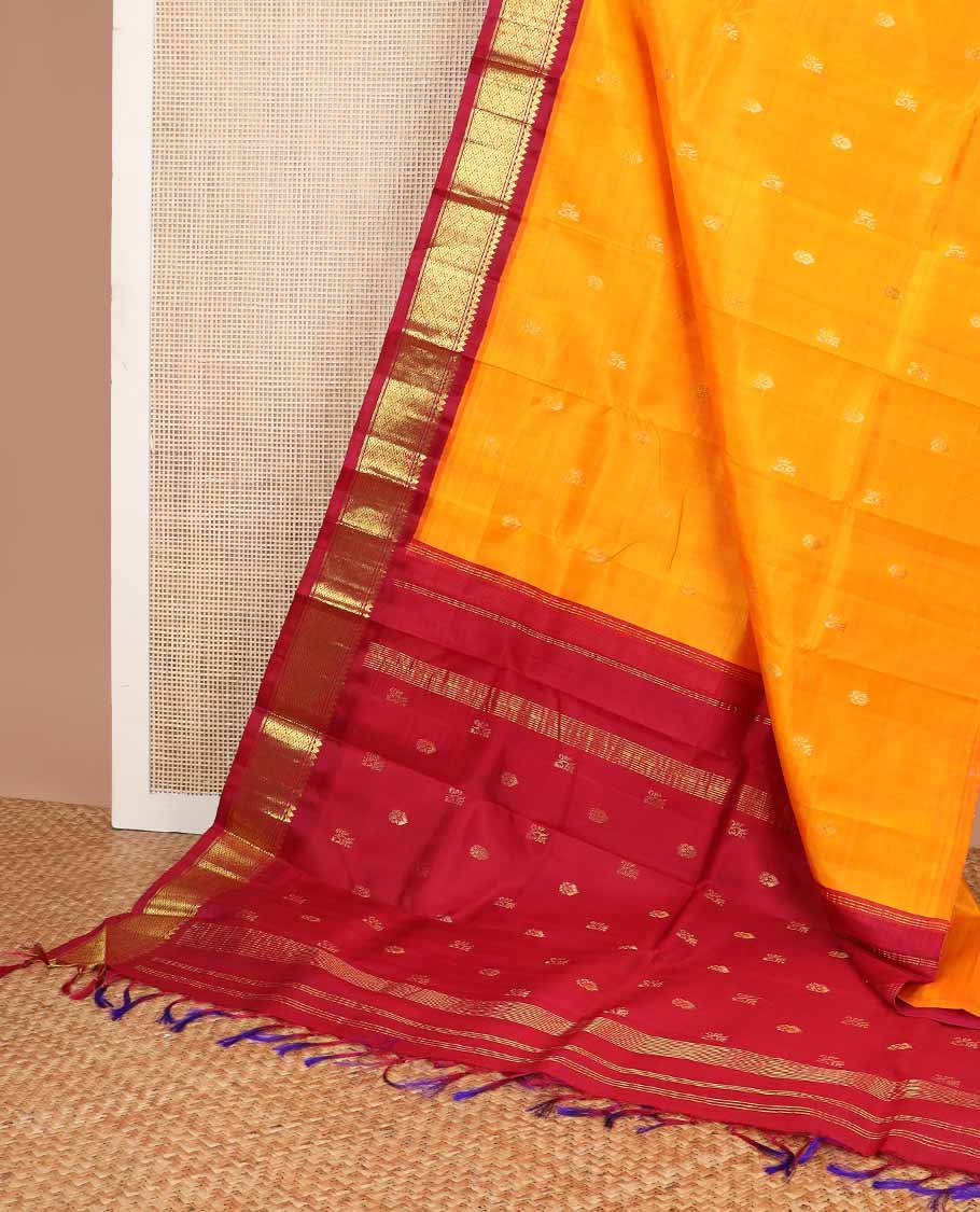 Orange buttas kancheepuram silk saree with contrast korvai zari design border & floral design pallu