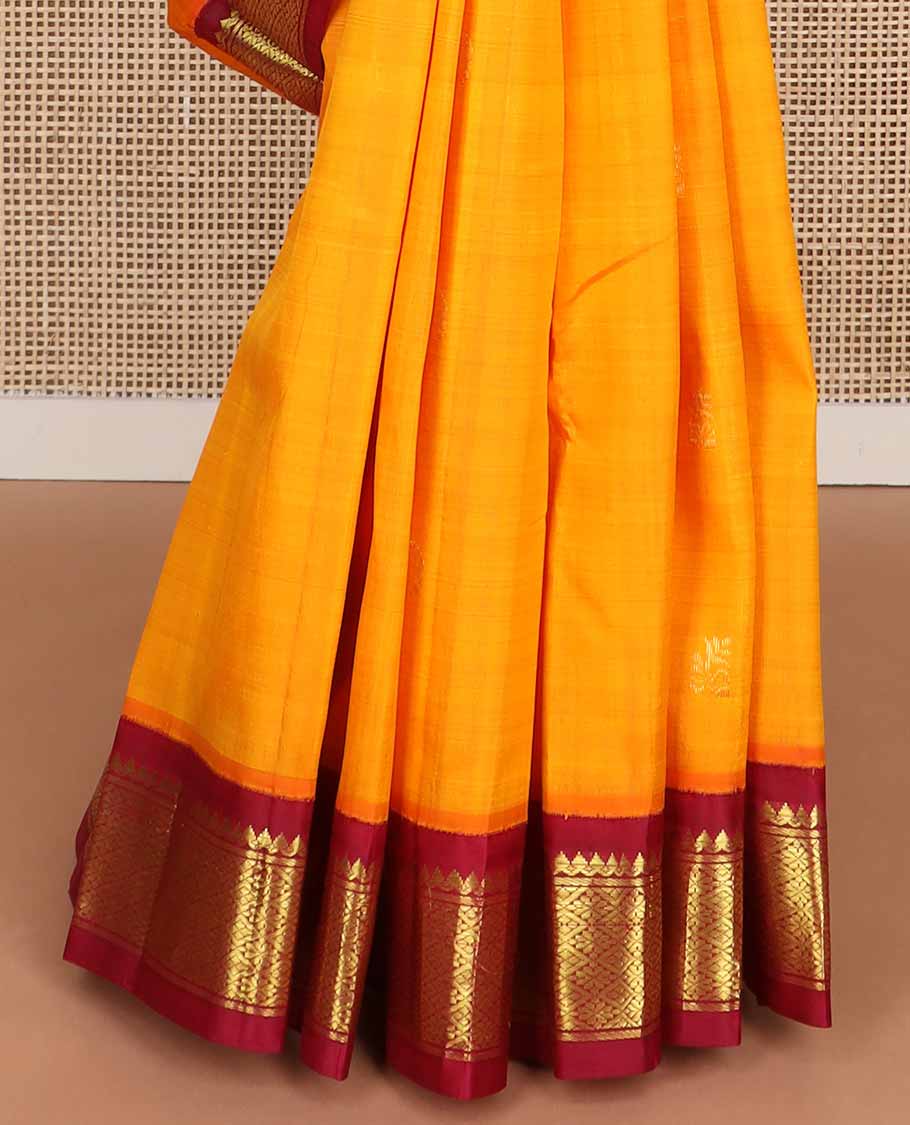 Orange buttas kancheepuram silk saree with contrast korvai zari design border & floral design pallu