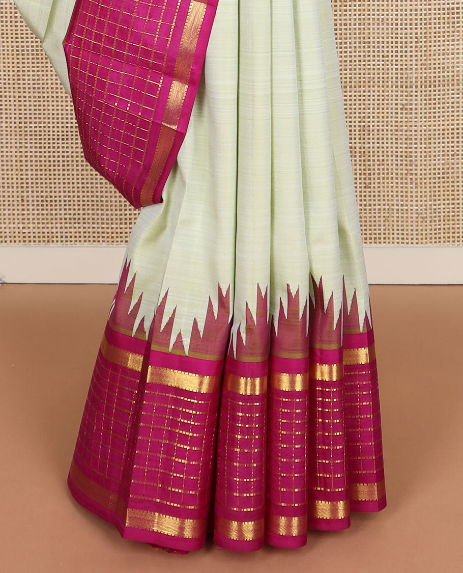 Pale green zari buttas kanchipuram silk saree, contrast one-sided thazampoo rekku muthu kattam border & pallu of zari stripes & thazampoo rekku