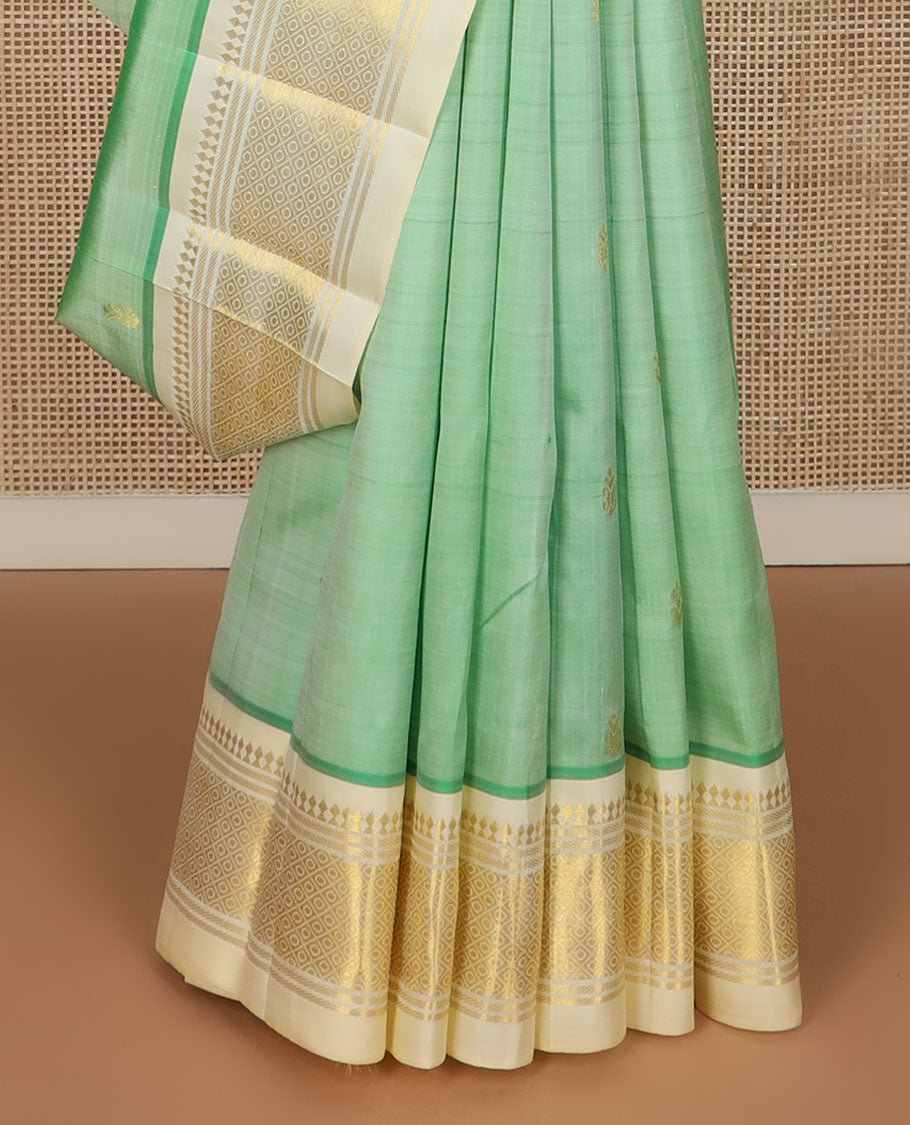 Turquoise buttas Kanchipuram silk saree, contrast border of panner sombu, banaras & mayil kann design & zari design pallu