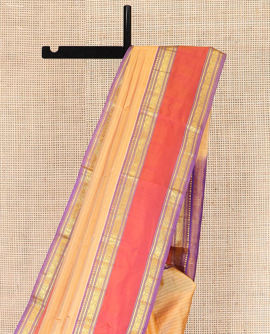 Light Orange Kanchipuram Silk Saree Embellished with Vazhaipoo Stripes, Complemented by Contrast Rettai Pettu Border of Rekku, Kathir, Muthu, and Jada Nagam Designs, Zari Woven Pallu, and Paired with a Contrast Blouse
