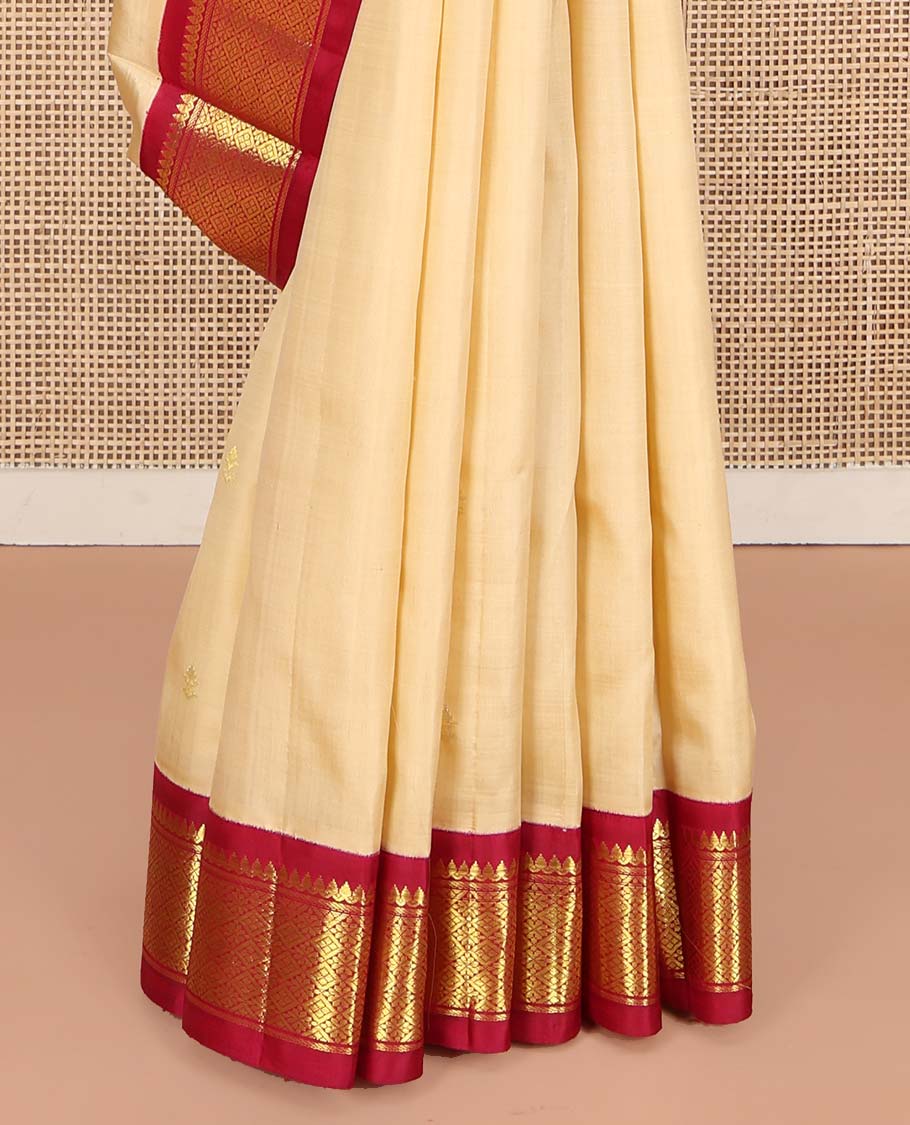 Sandal Kanchipuram Silk Saree, Sparsely Woven with Zari Buttas on Its Body, Complemented by Contrast One-Sided Border of Thilakam Mokku, and Jaal Designs, Pallu of Zari Designs, and Comes Without a Blouse