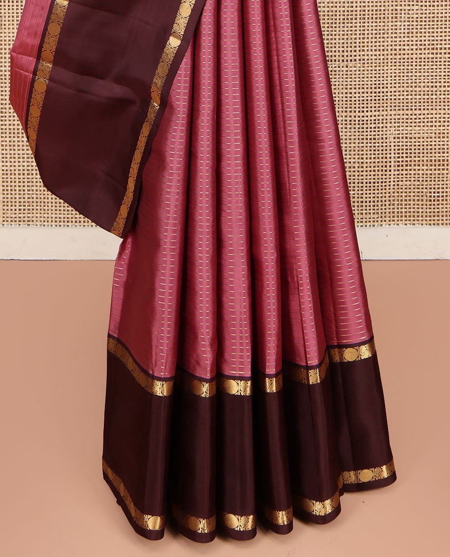 Pink Kanchipuram Silk Saree, Subtly Enriched with Zari Stripes All Over Its Body, Complemented by Contrast Rettai Pettu Border of Mayil and Rudraksham Designs, Gleaming Zari-Striped Pallu, and Paired with a Contrast Blouse