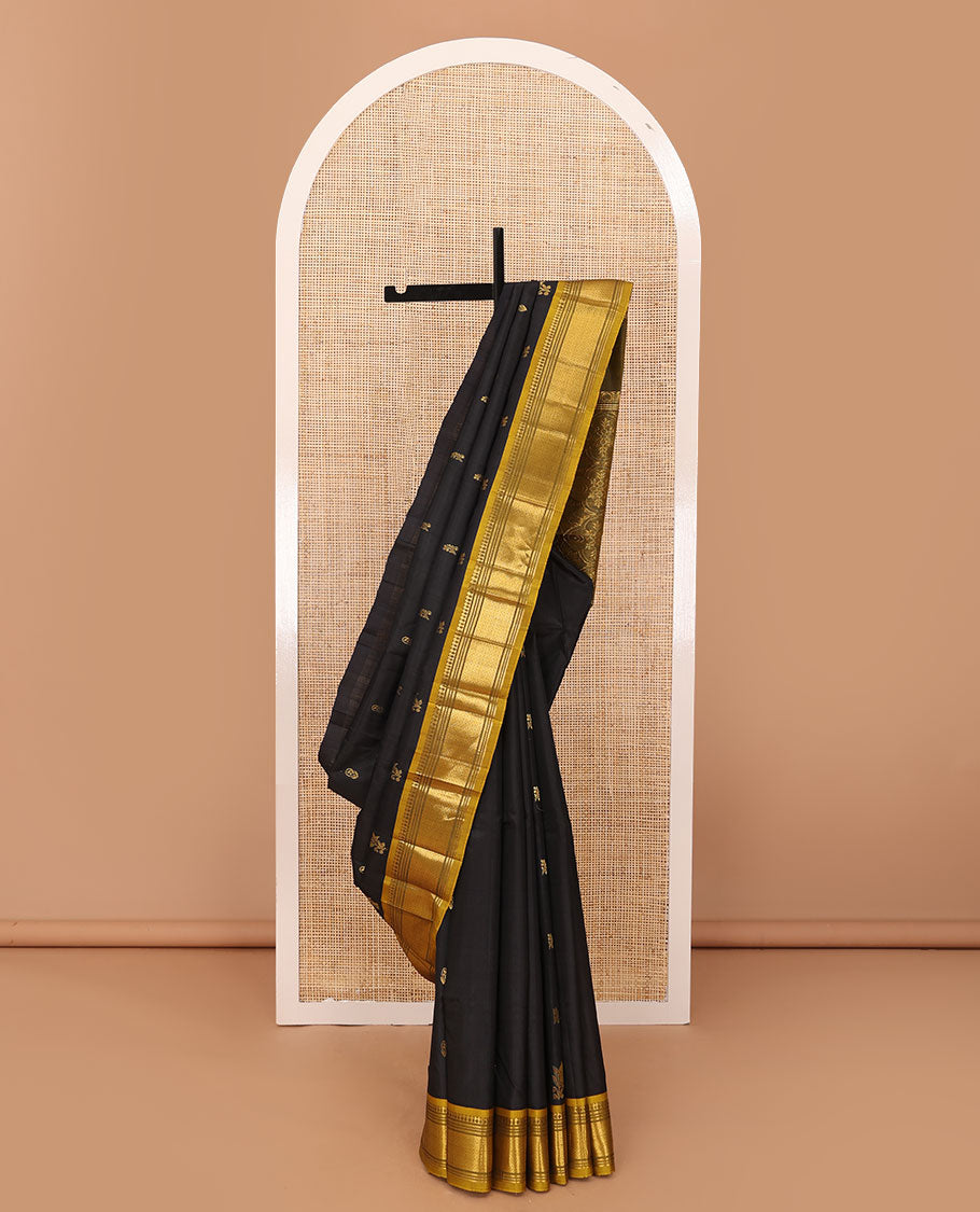 Black zari buttas Kanchipuram silk saree, contrast one-sided border of panner sombu,banaras,muthu & mayil kann & four-petal floral motifs woven pallu