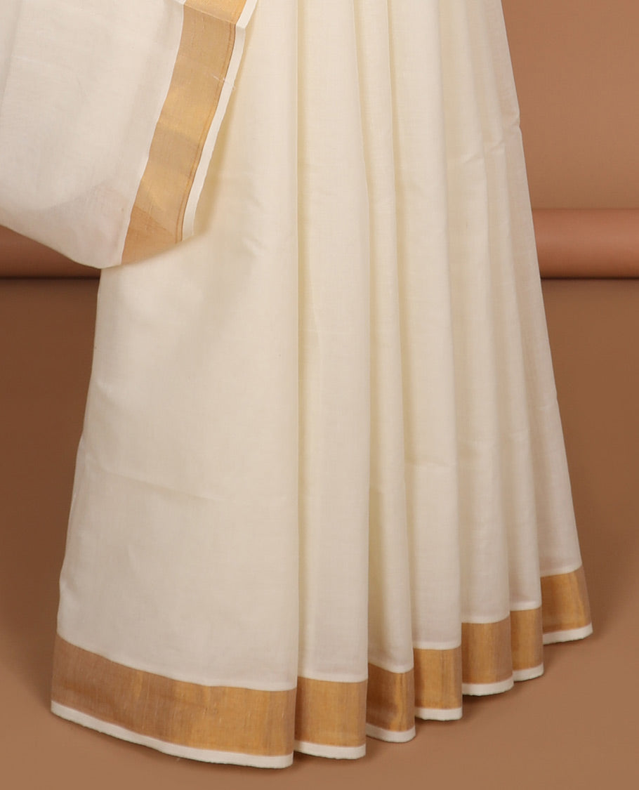 Cream plain design kerala saree, zari border & pallu of traditional zari designs
