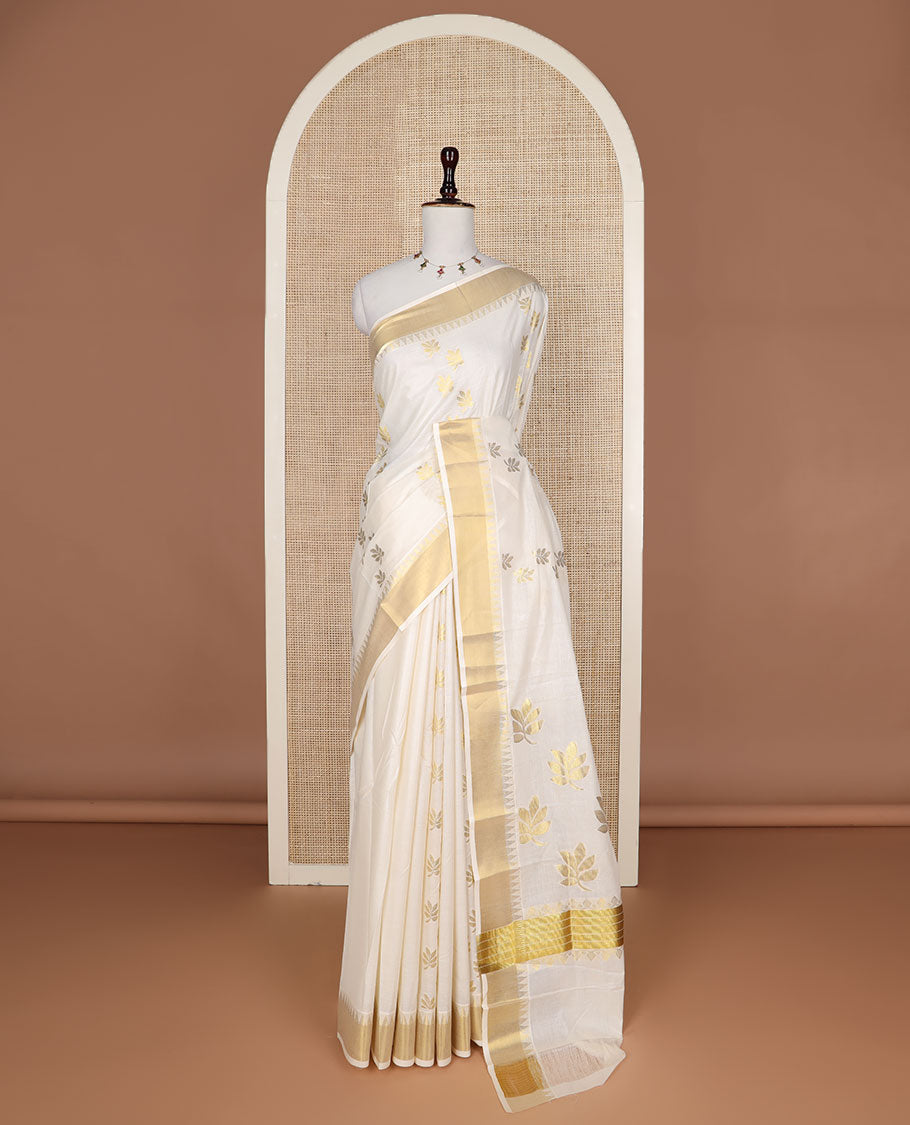 Cream leaf buttas Kerala saree, zari temple border, and pallu of leaf designs