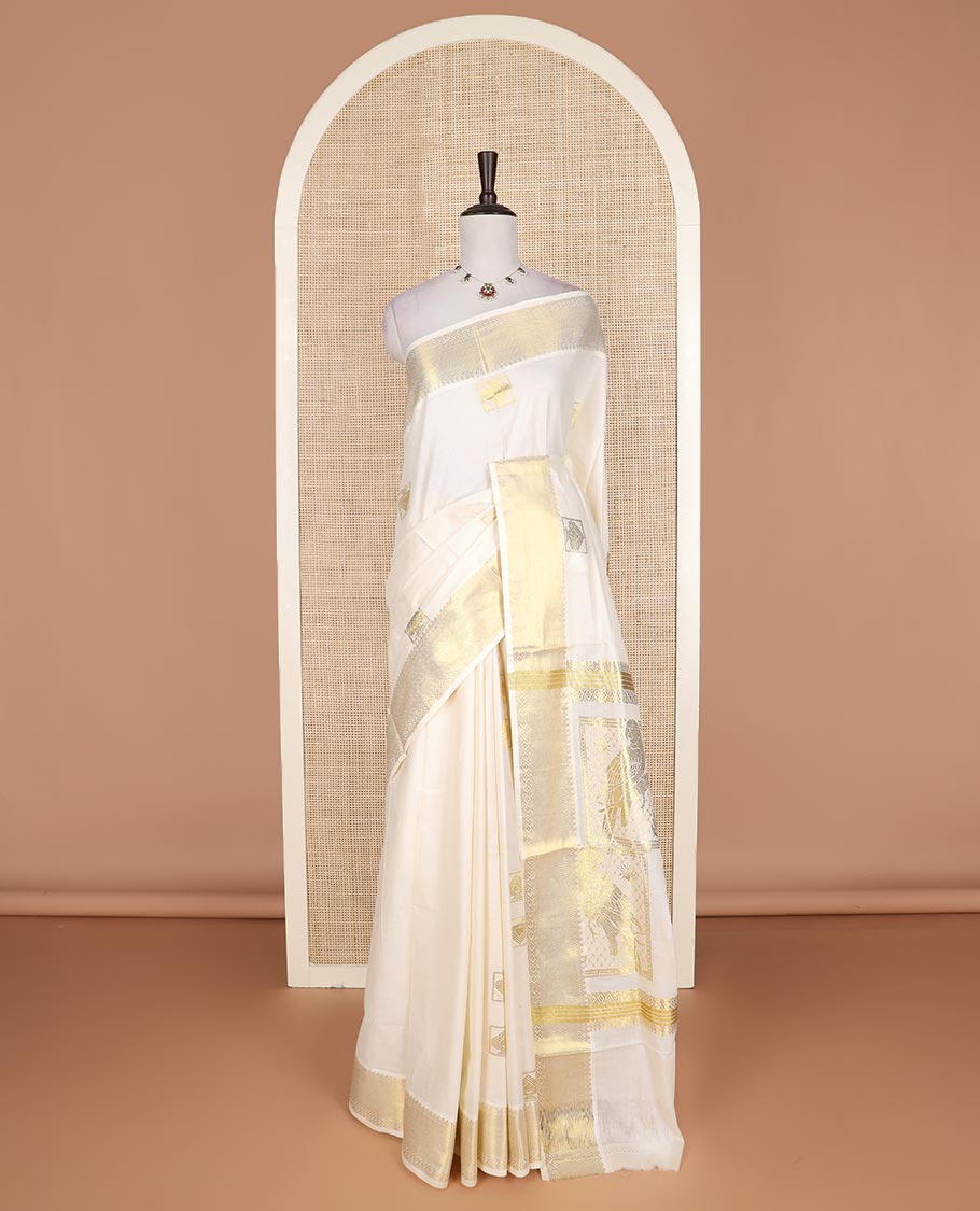 Cream zari buttas Kerala cotton saree, traditional zari border, and intricately designed pallu