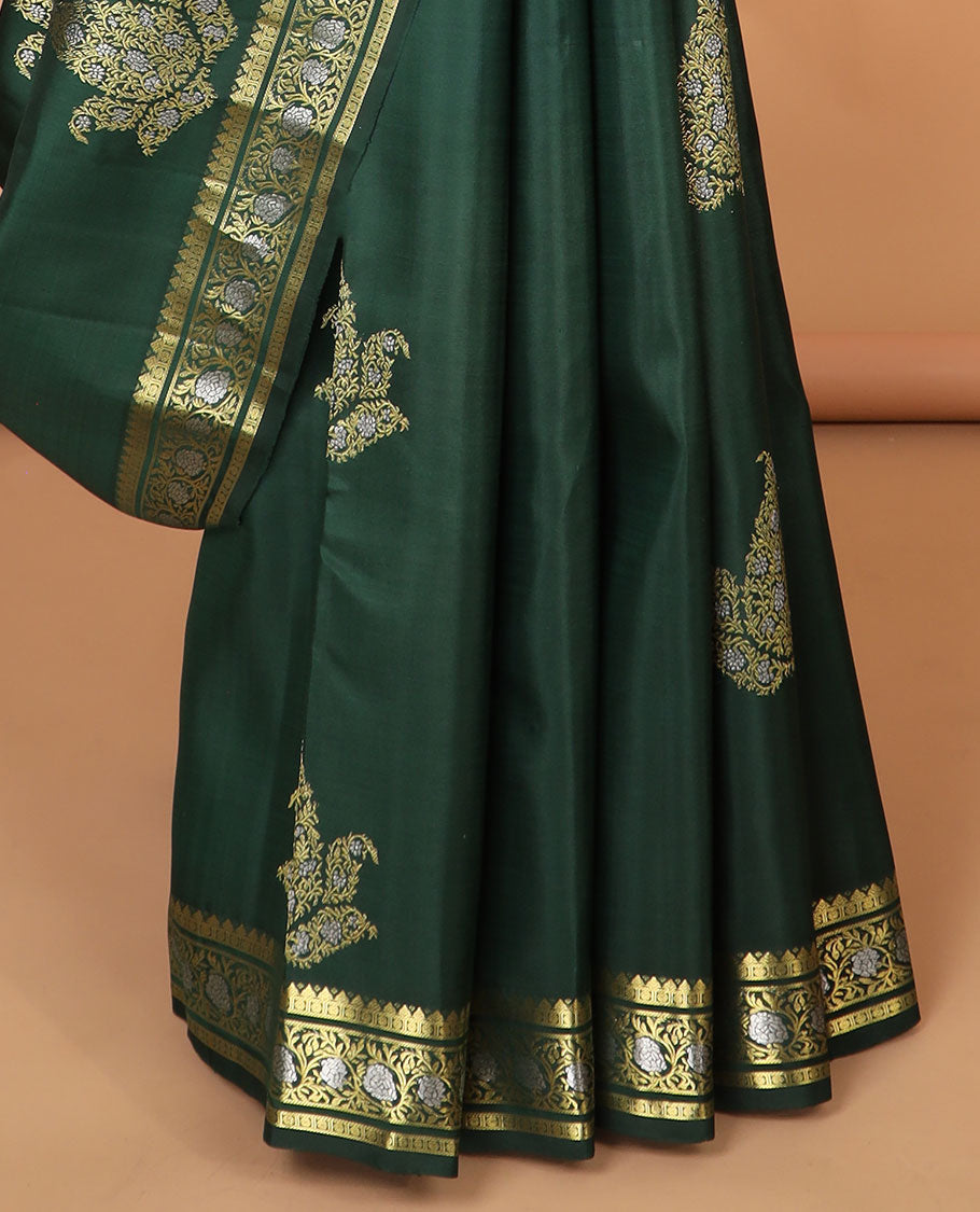 Green floral buttas kancheepuram silk saree with self border of rekku, paun, kodi visiry design & floral striped design pallu