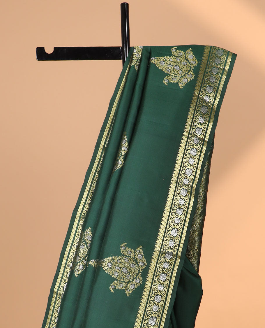 Green floral buttas kancheepuram silk saree with self border of rekku, paun, kodi visiry design & floral striped design pallu