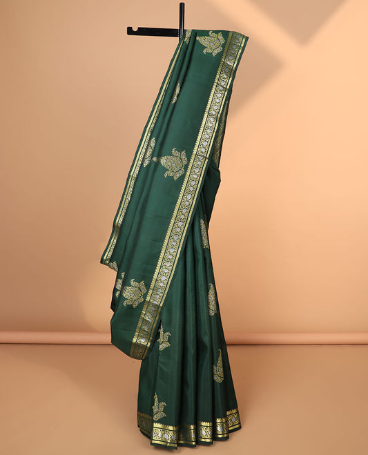 Green floral buttas kancheepuram silk saree with self border of rekku, paun, kodi visiry design & floral striped design pallu
