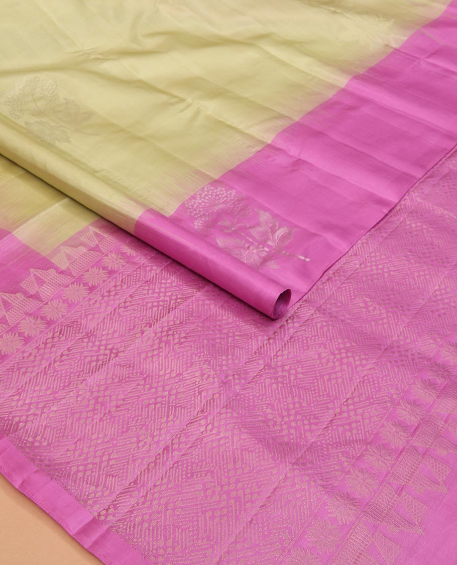 Light Sandal Mayuri Soft Silk Saree Sparsely Sparkled with Floral Zari Buttas All Over Its Body, Complemented by a Contrast Border of Floral Zari Designs, Majestically Detailed Pallu, and Paired with a Contrast Blouse