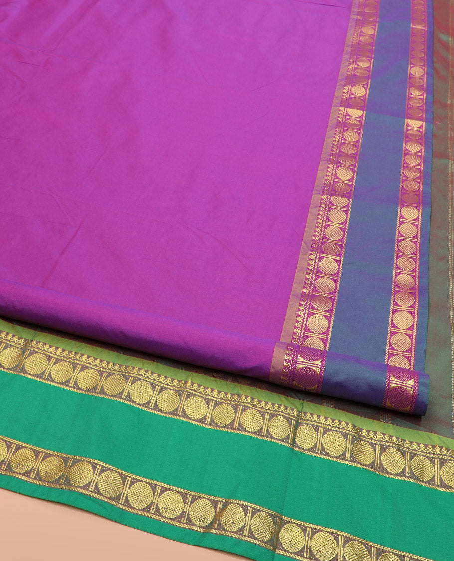 Purple Plain Ten-Yard Art Silk Saree Complemented by a Contrast Rettai Pettu Rudraksham Motifs Border, and Pallu Steeped with Rudraksham Motifs in Zari