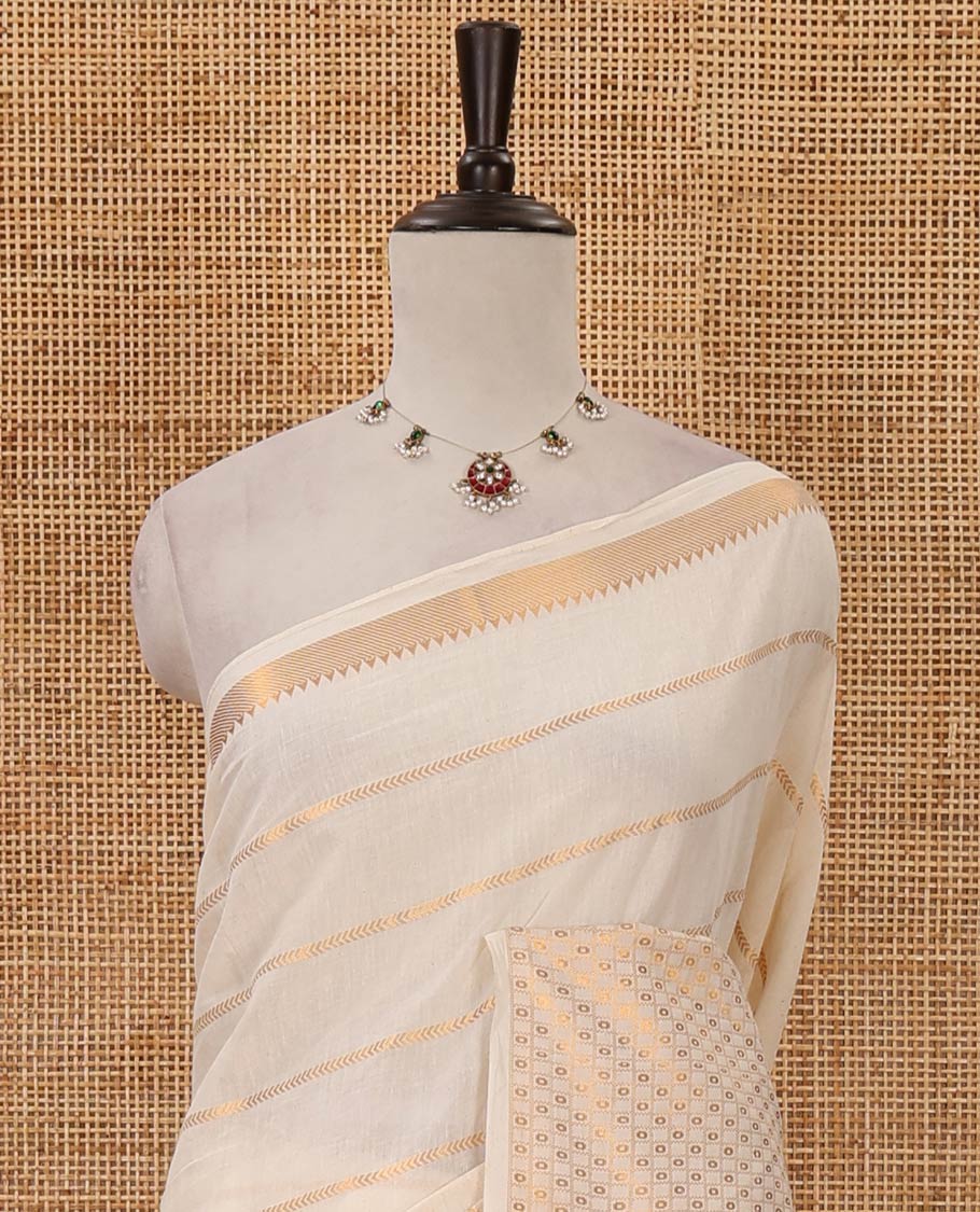 Cream zari striped sungudi cotton saree,1000 buttas temple border of butta enclosed checks, striped pallu & gopuram zari woven red border