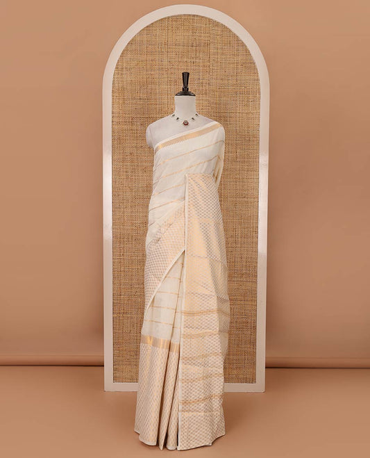 Cream zari striped sungudi cotton saree,1000 buttas temple border of butta enclosed checks, striped pallu & gopuram zari woven red border
