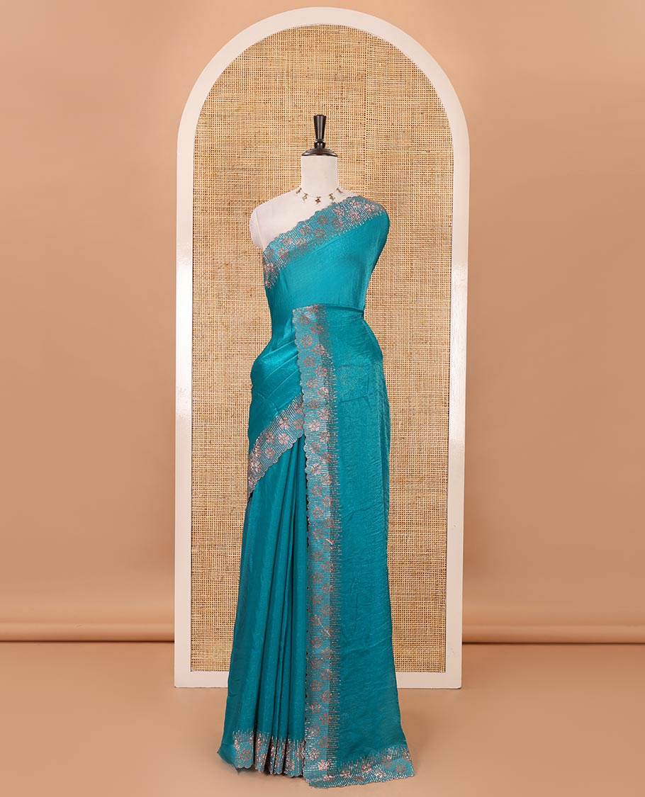 Peacock green full-plain Fendy satin saree, scallop floral micro-stone embroidered border, self-pallu & contrast stone work blouse