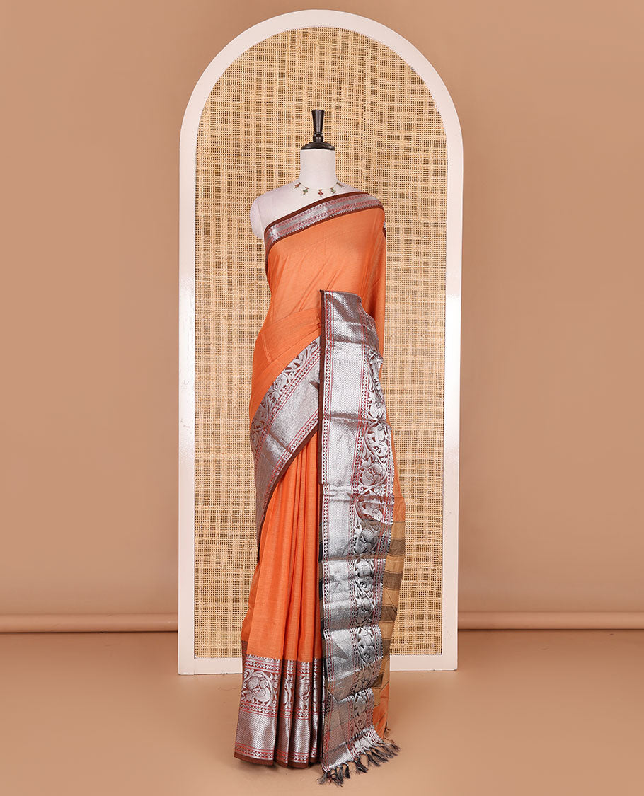 Orange plain mercerised cotton saree, contrast traditional zari border of elephant and peacock designs, striped pallu, and plain blouse