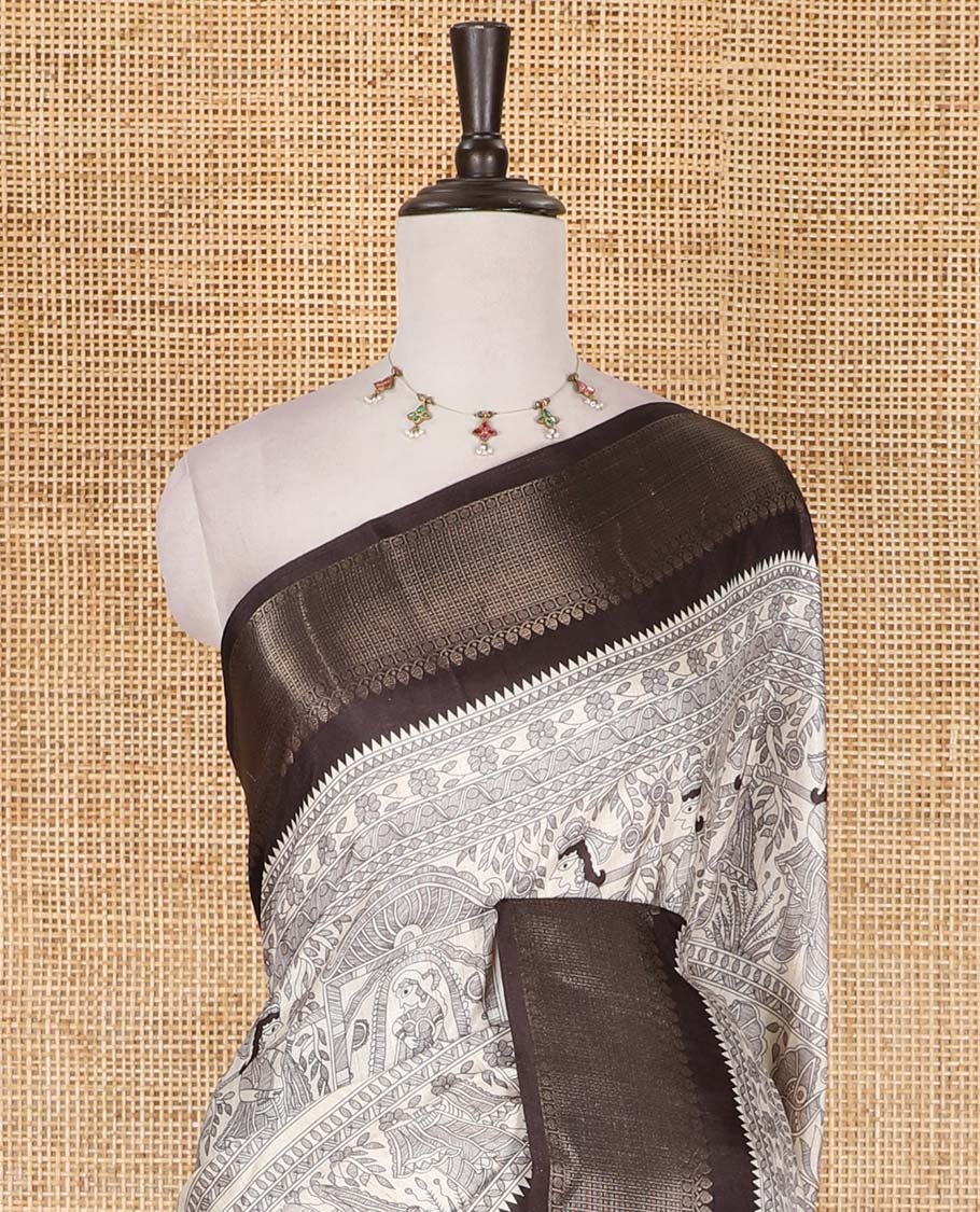 Cream and black Madhubani village theme characters printed soft tussar saree, contrast traditional zari border, Madhubani printed pallu, and a matching blouse