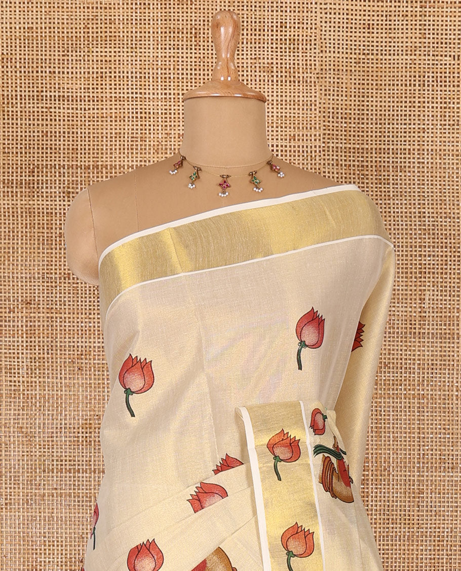 Gold-red pichwai lotus printed Kerala cotton saree, gold zari with lotus printed border, pallu features hand-holding lotus motifs, and lotus printed blouse