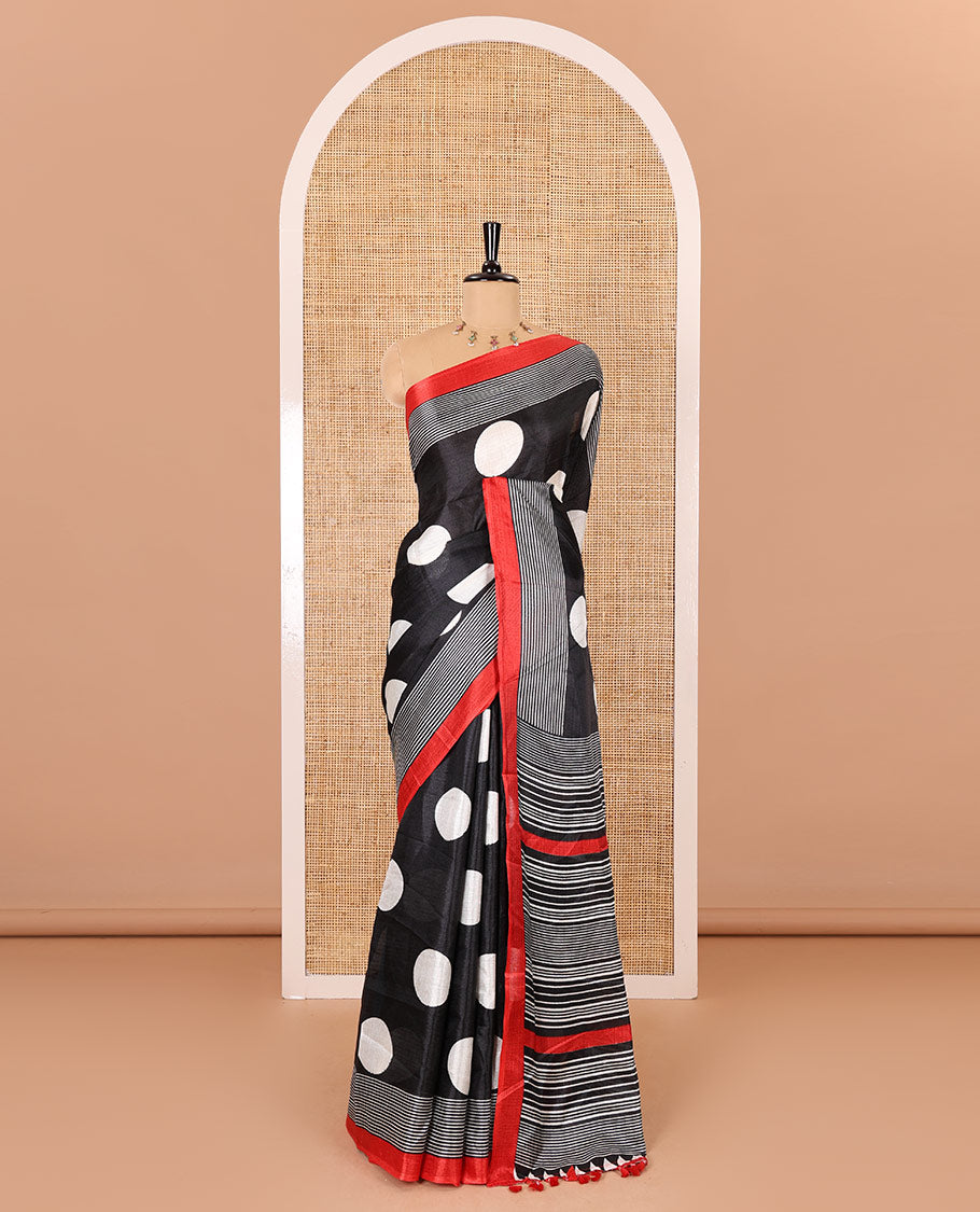 Black polka dots printed art khadi cotton saree, contrast striped border, striped pallu, and a contrast striped blouse
