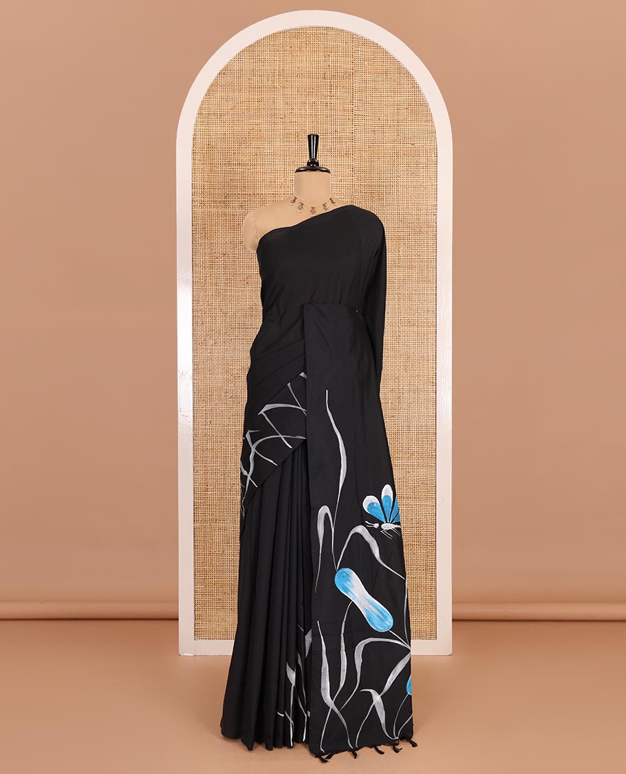 Borderless black floral and dragonfly motifs printed South cotton saree, printed pallu, and a matching floral printed blouse