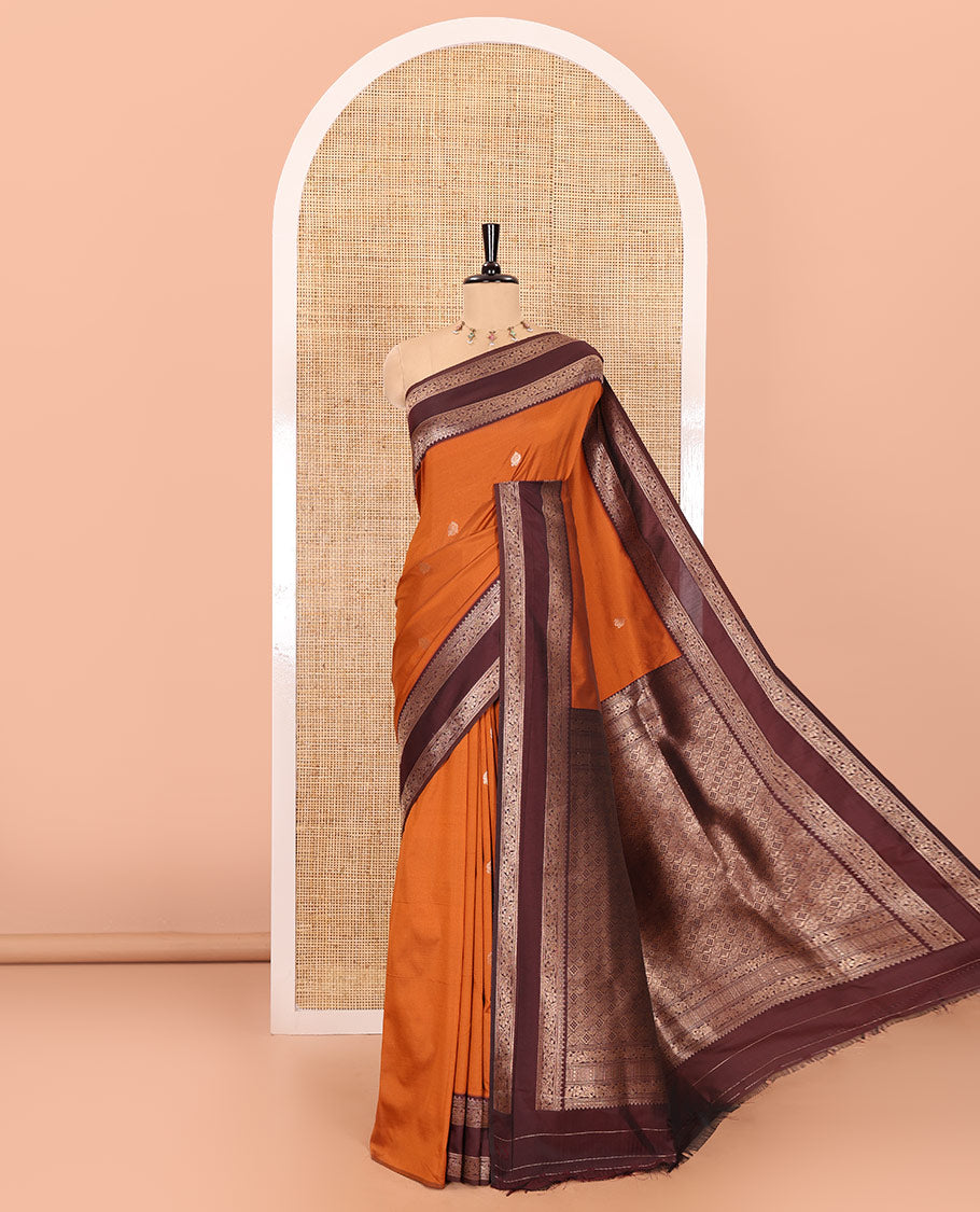 Rust orange zari buttas kanchi soft-silk saree, contrast traditional zari design rettai pettu border of floral creeper designs, intricate pallu, and a contrast zari design blouse