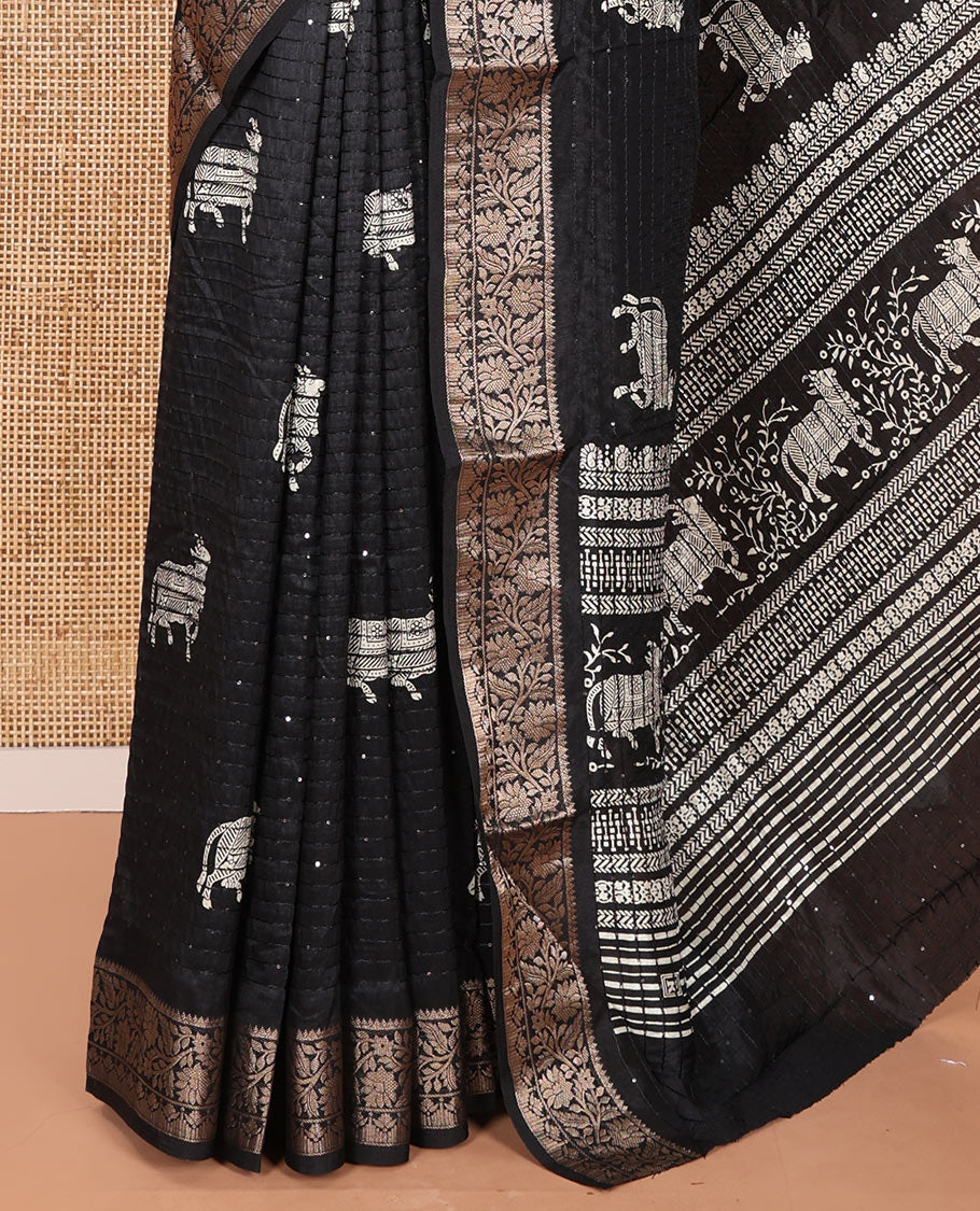 Black Dola Silk Saree Featuring Sequin Stripes and Pichwai Cow Motifs, Decorated with a Floral Creeper Zari-Woven Border, a Printed Pallu, Paired with a Matching Blouse