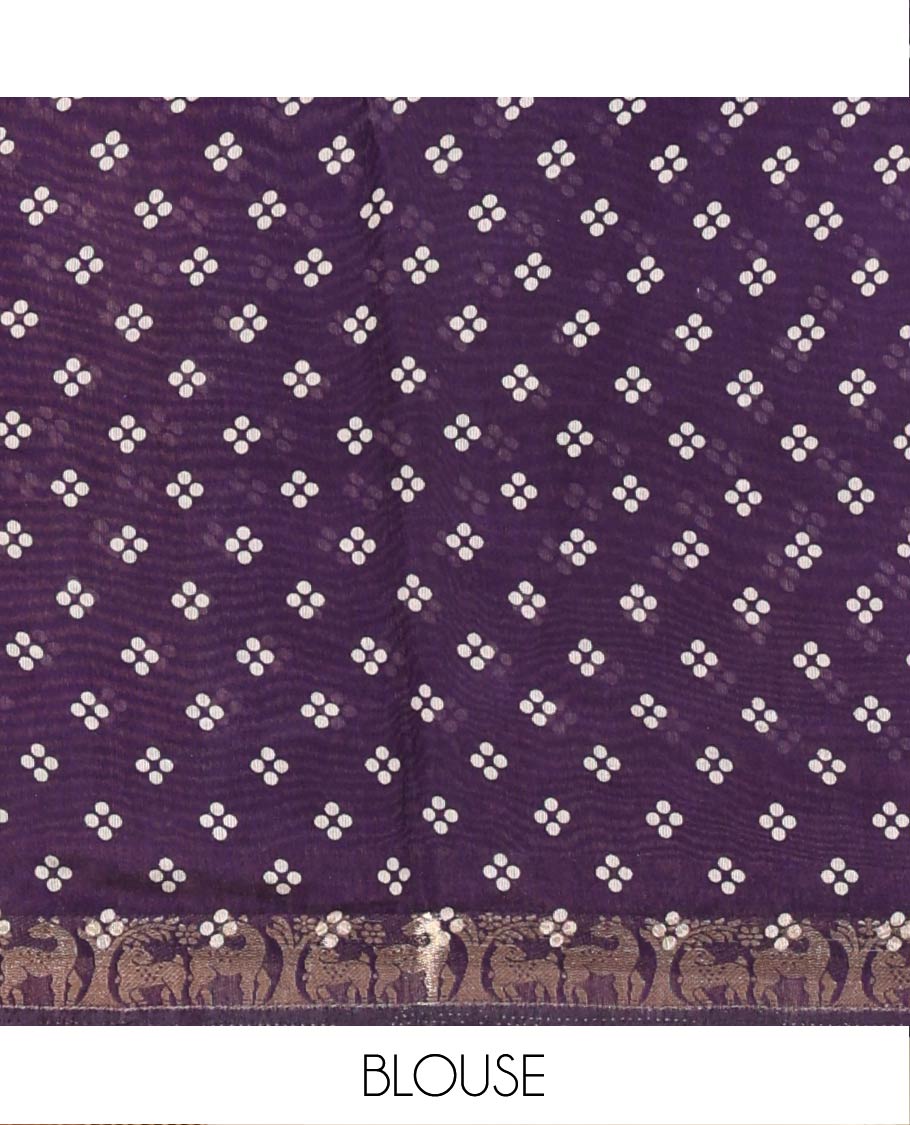 Purple Muslin Cotton Saree Adorned with Zig-Zag Shibori Patterns Prints, Complemented by a Contrast Border of Deer Motifs in Zari, Pallu Decked Up with Scenery Print, and Paired with a Contrast Polka Dots Printed Blouse
