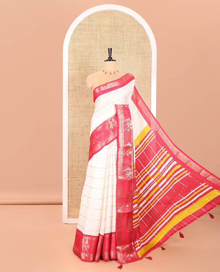 Cream Moss Chiffon Saree Embellished with Zari Stripes and Temple Designs, Complemented by a Contrast Traditional Zari Border of Parrot Motifs, Pallu Accentuated with Colorful Stripes, and Paired with a Contrast Blouse
