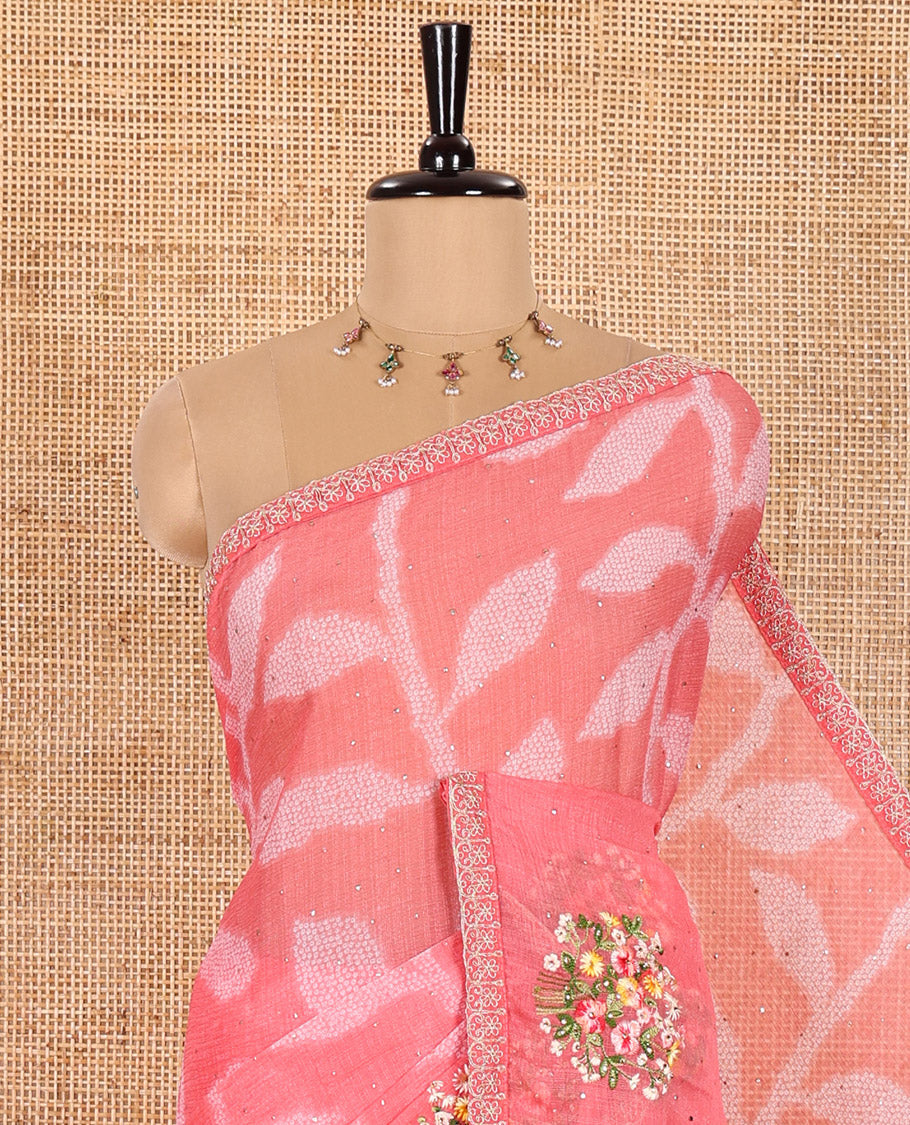 Pink Weightless Chiffon Saree Spotlighted with Leaf Vine Print, Sparkling Glitter Work, and Colorful Floral Motifs Thread Embroidery on Its Body, Comes with a Piping Embroidered Border, and a Matching Jaal Embroidered Blouse