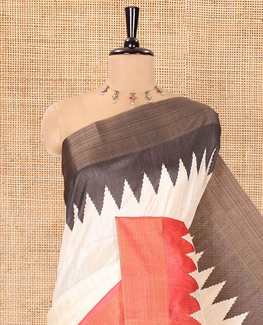 Cream Plain Semi-Jute Tussar Saree, Complemented by a Contrast Blue-Red Ganga-Jamuna Temple Border, Sparsely Striped Pallu, and Paired with a Contrast Blouse
