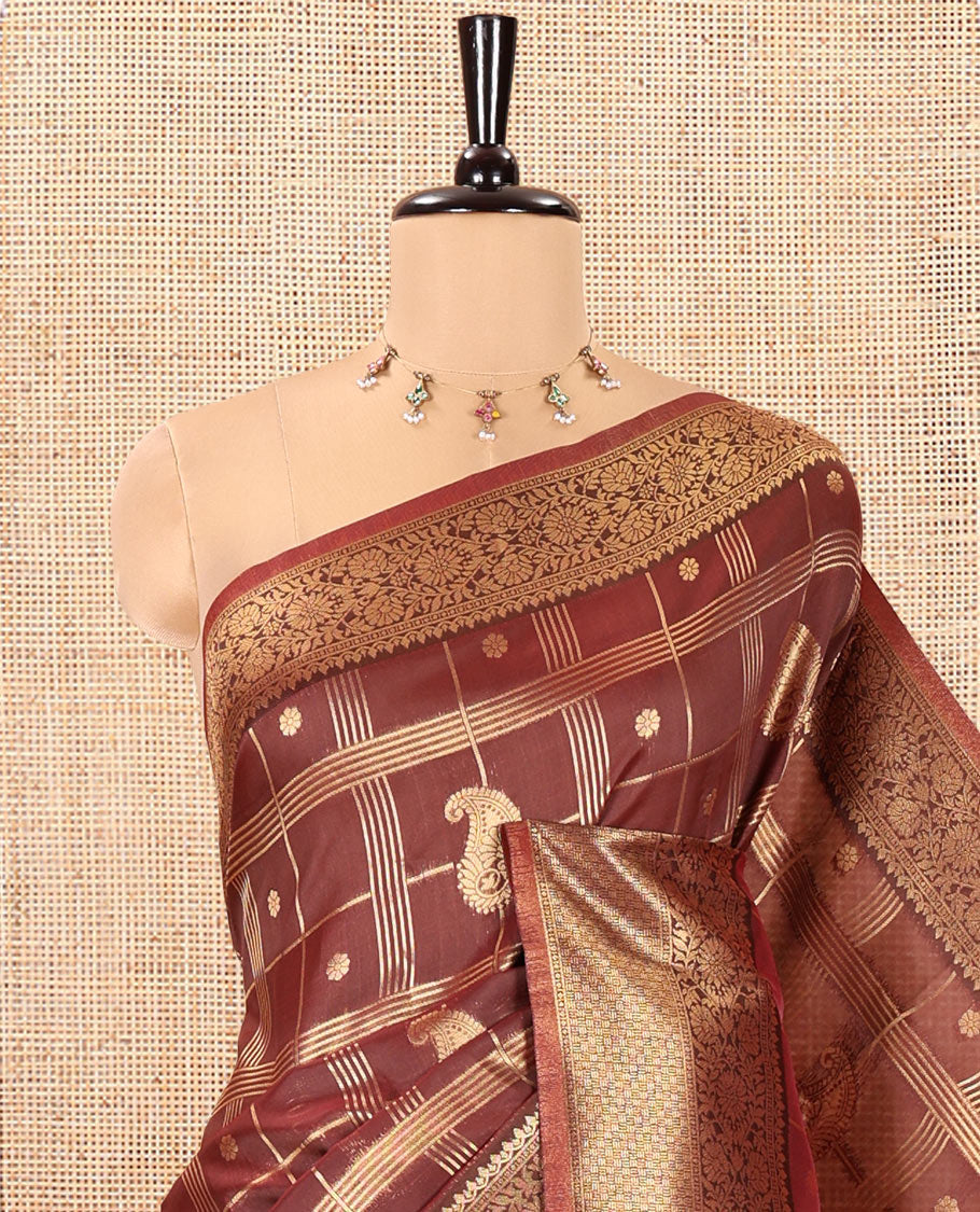 Brown Kanchi Silk Saree, Richly Detailed with Floral- Paisley Butta Enclosed Checks All Over Its Body, Highlighted by Floral Creeper Zari Border, a Grand Jaal Pallu, and Paired with a Jacquard Blouse