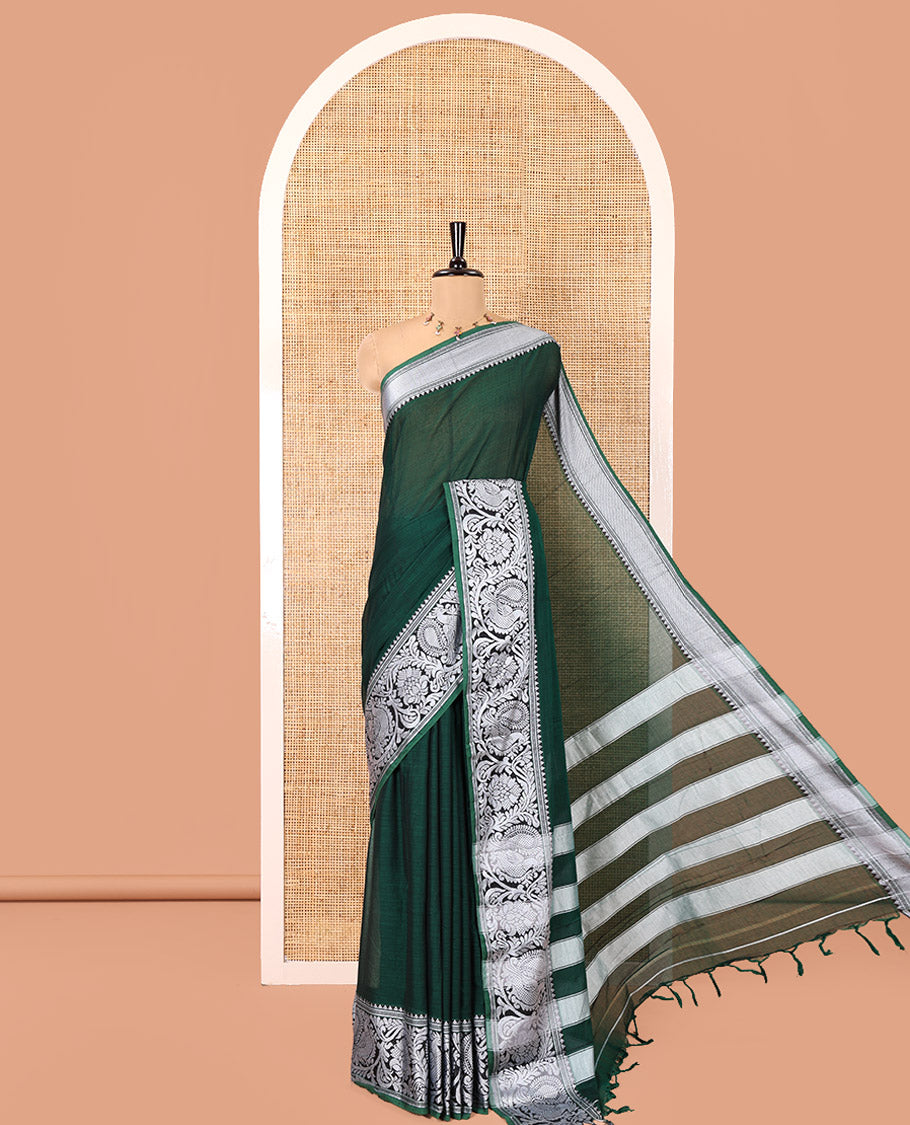 Green Plain Mercerised Cotton Saree, Highlighted by a Self-Border of Temple, Peacock, and Floral Designs, Striped Pallu, and Paired with a Matching Blouse