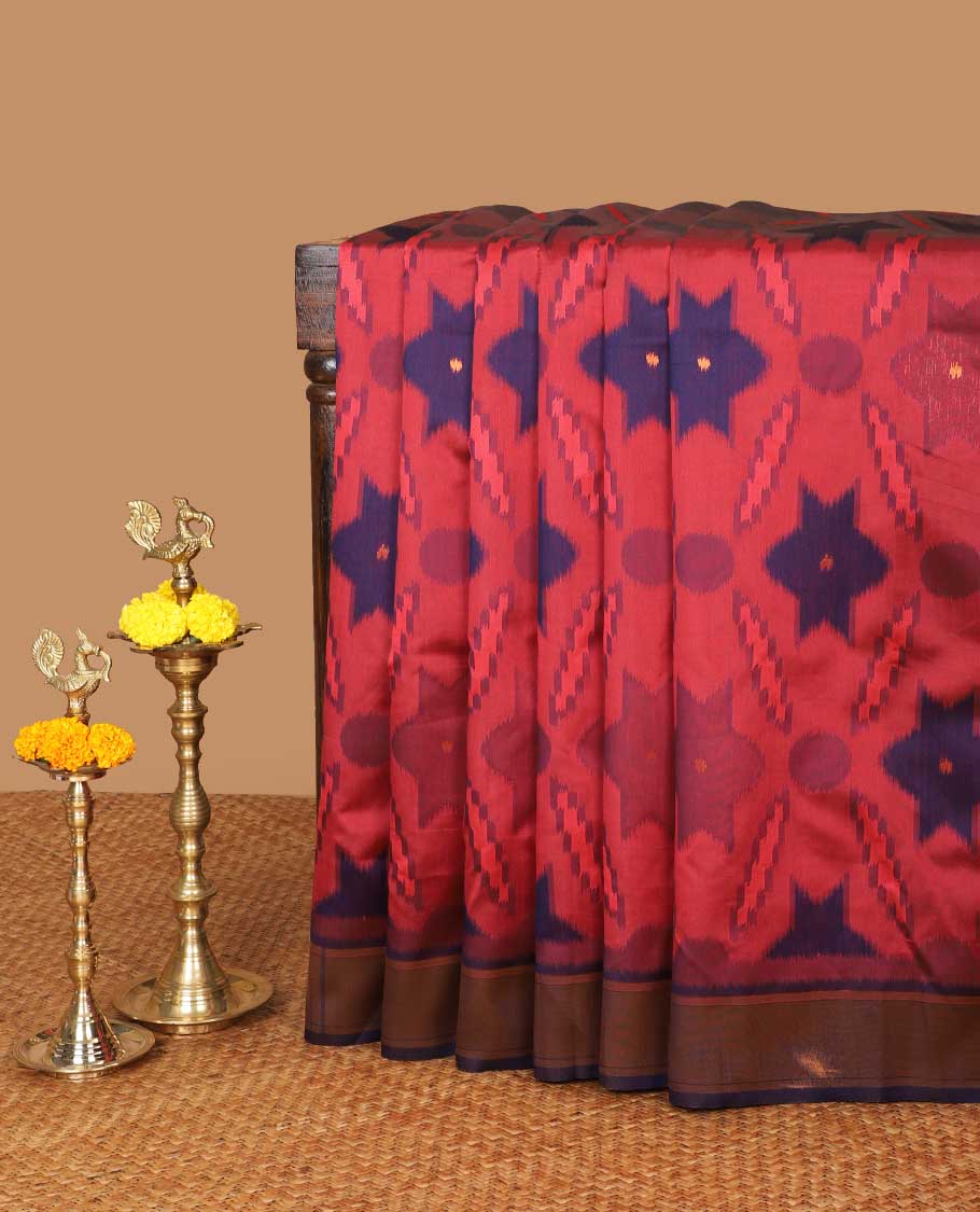Light red pochmmpally ikkat design mulberry silk saree with zari katti border & zari ikkat desig pallu along with contrast blouse