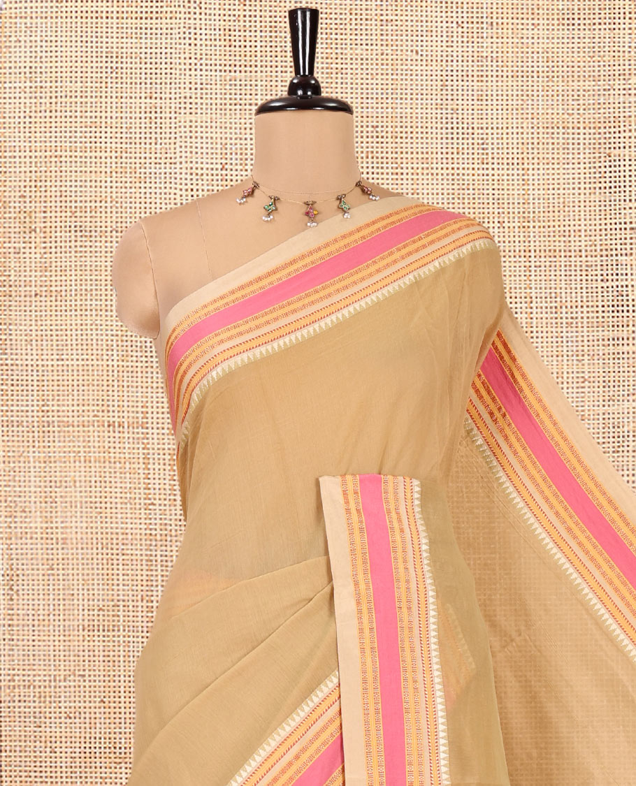 Chikku Plain Mercerised Cotton Saree, Complemented by Contrast Traditional Border, Striped Pallu, and a Matching Blouse