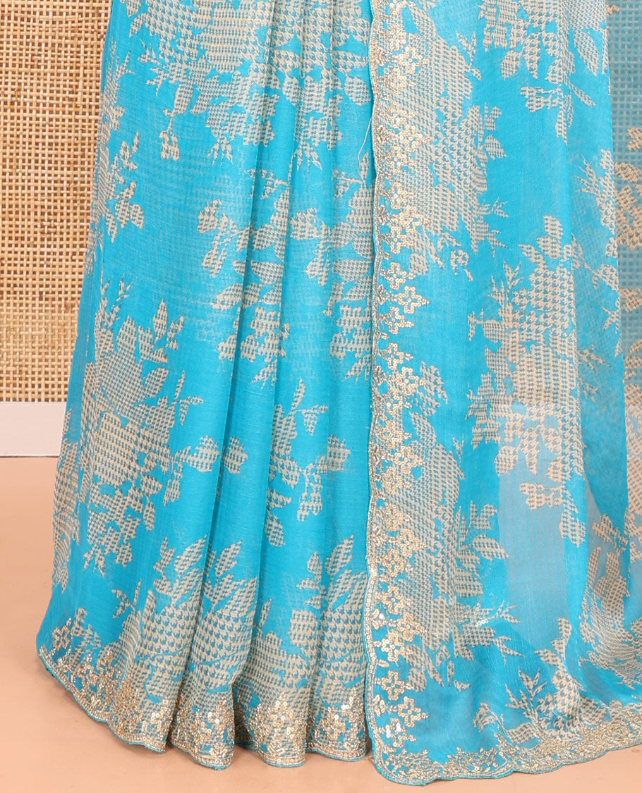 Blue Chiffon Saree Features Abstract Print, a Scallop Sequins Work Border, and Contrast Blouse