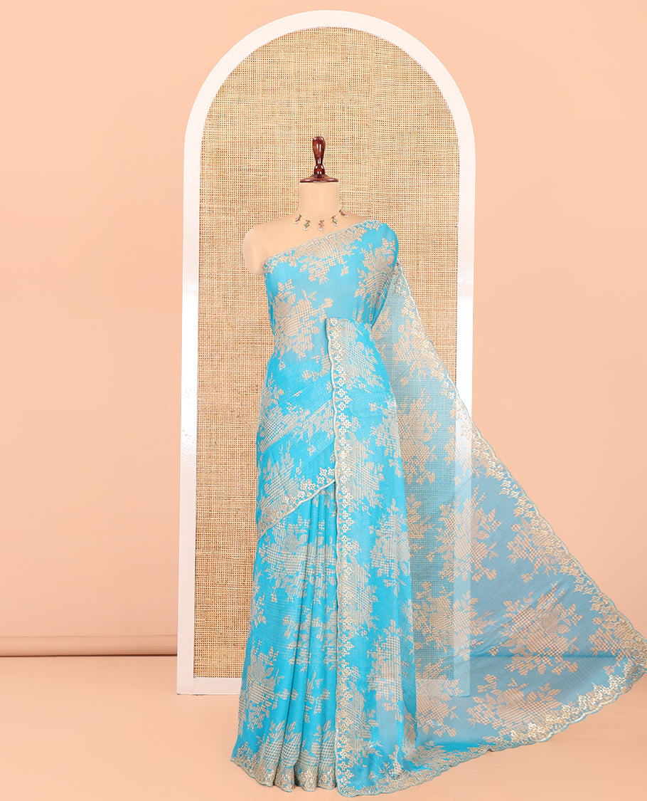 Blue Chiffon Saree Features Abstract Print, a Scallop Sequins Work Border, and Contrast Blouse