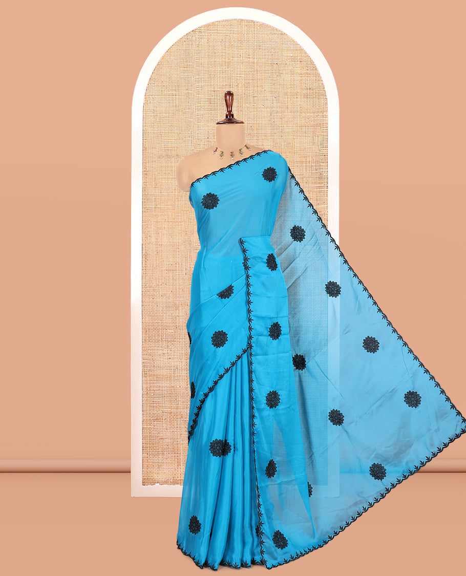 Blue Chiffon Saree, Gracefully Embellished with Floral Embroidery Buttas, a Lace Embroidered Border, a Contrast Blouse