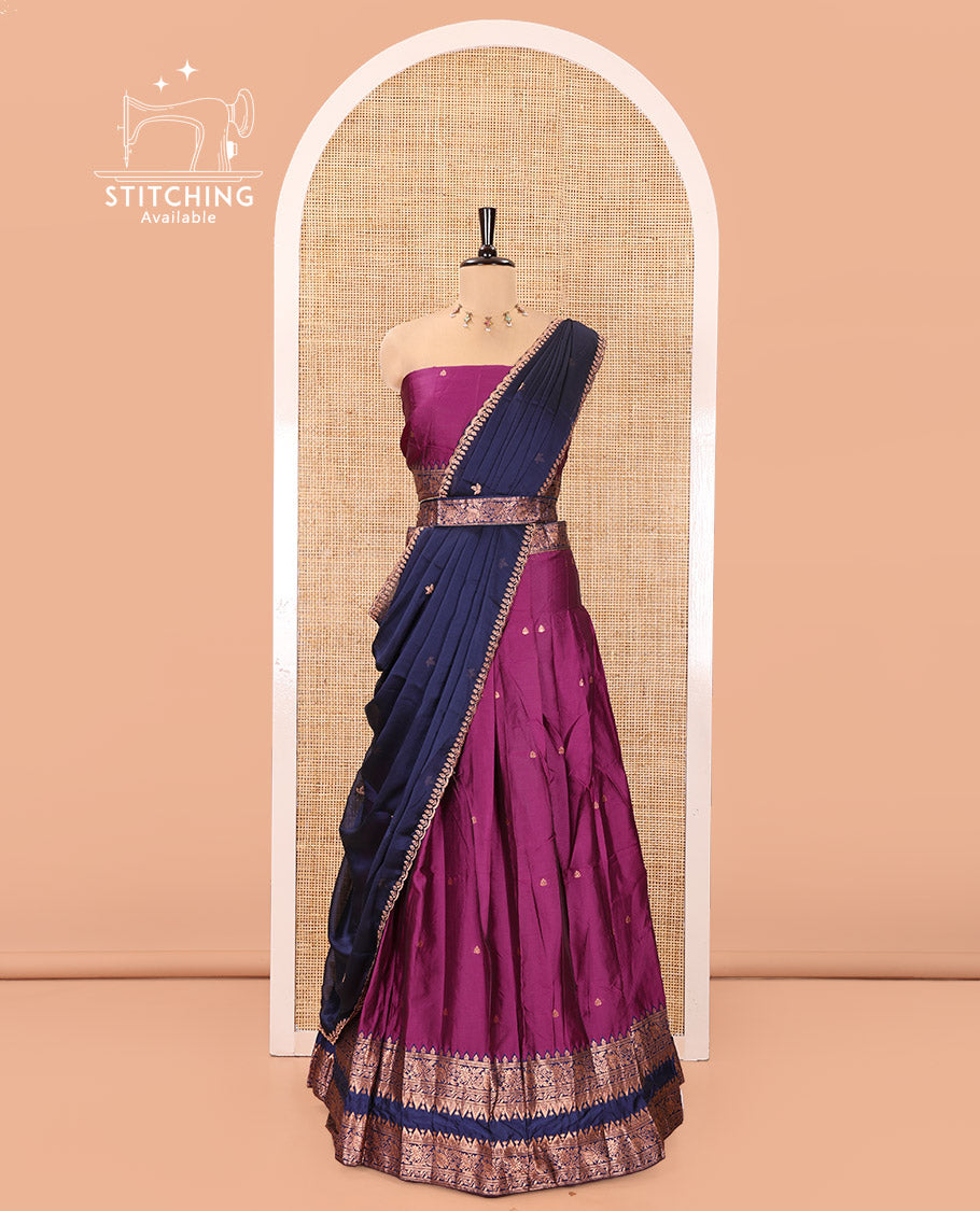 Dark Magenta and Blue Semi-Banarasi Half-Saree, Accentuated with Zari Buttas on Its Skirt, Complemented by a Contrast Rettai Pettu Traditional Zari-Design Border, Paired with a Matching Blouse, and Comes with a Contrast Satin Georgette Embroidered Dhavani