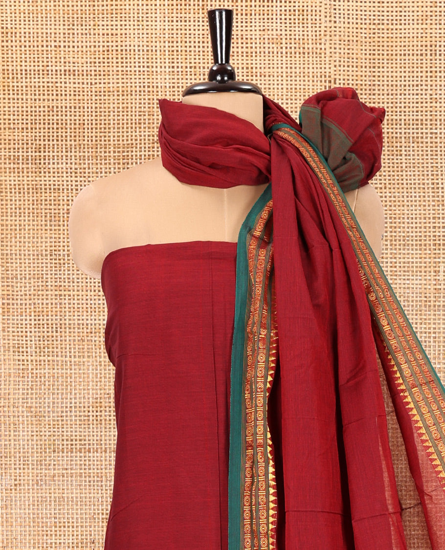 Maroon Mercerised Cotton Material Chudidar Set, Elevated with Rudraksham-Temple Bordered Top, a Mercerised Cotton Bottom, and Paired with a Matching Mercerised Cotton Rudraksham-Temple Bordered Dupatta